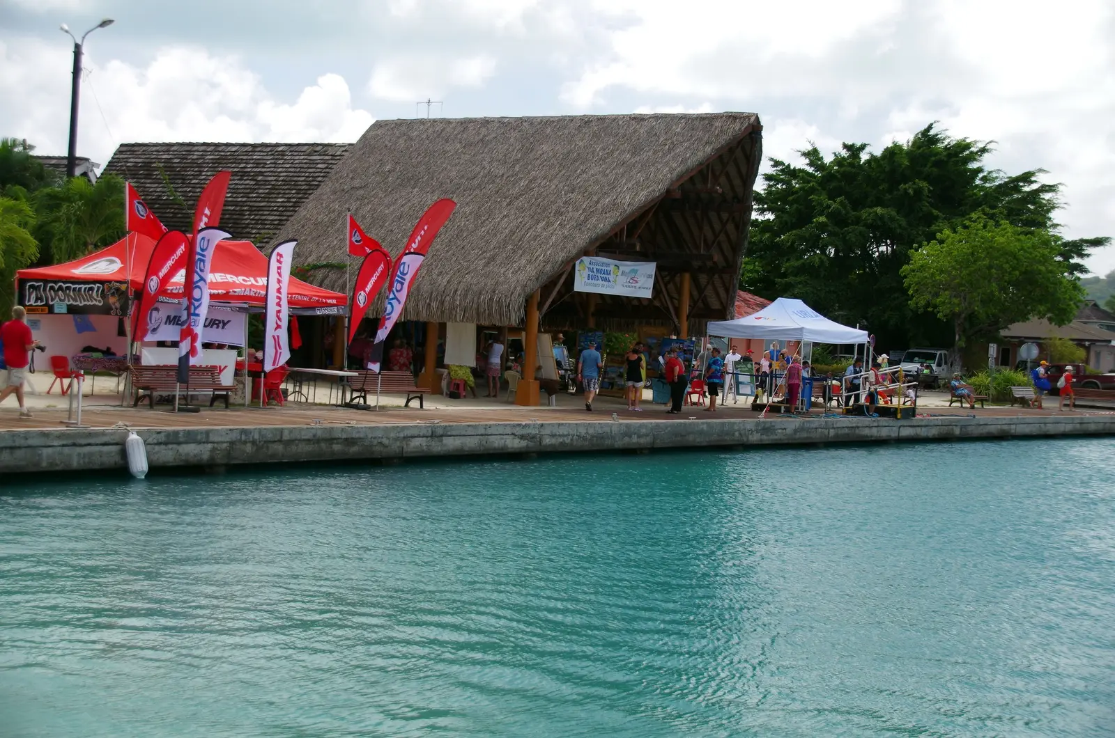 Vaitape harbour, a thatched pavilion on the quay