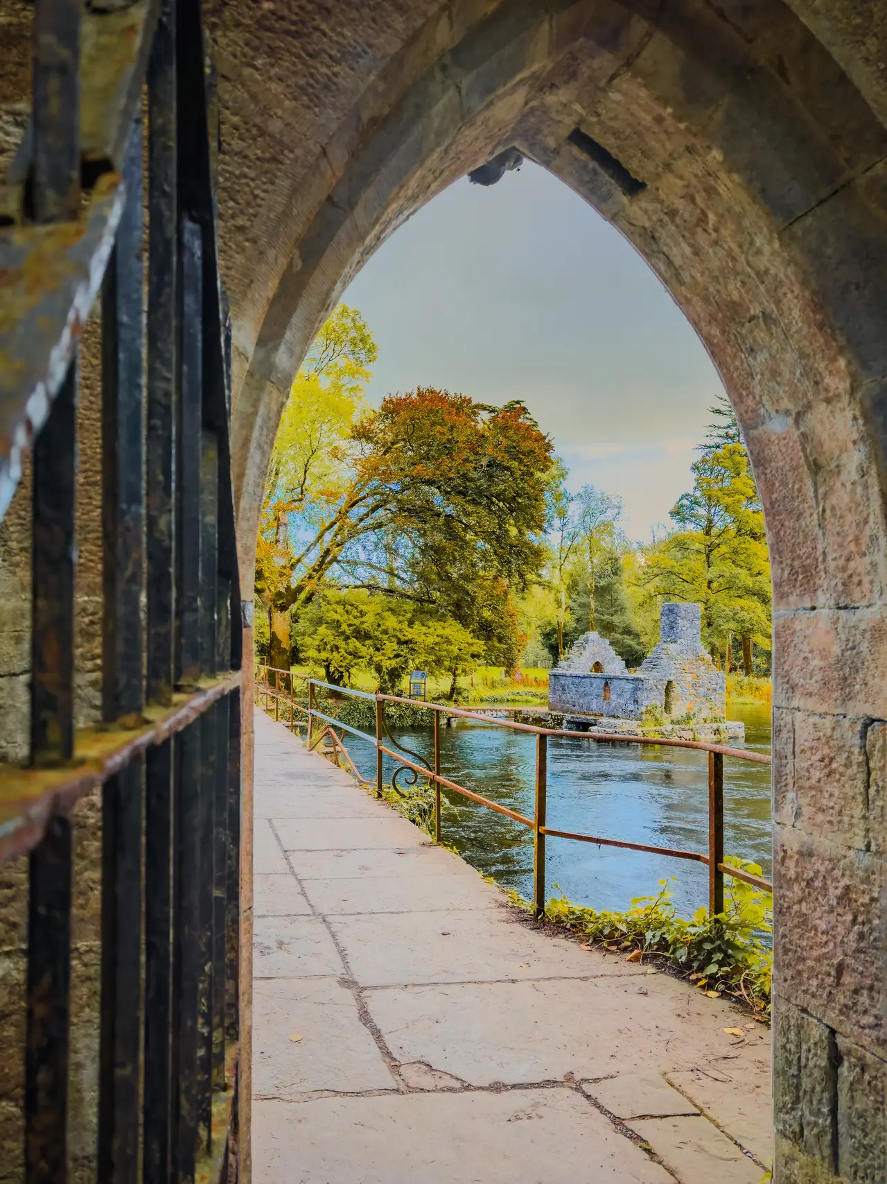 Monk’s Fishing House on the River Cong, seen through a stone arch