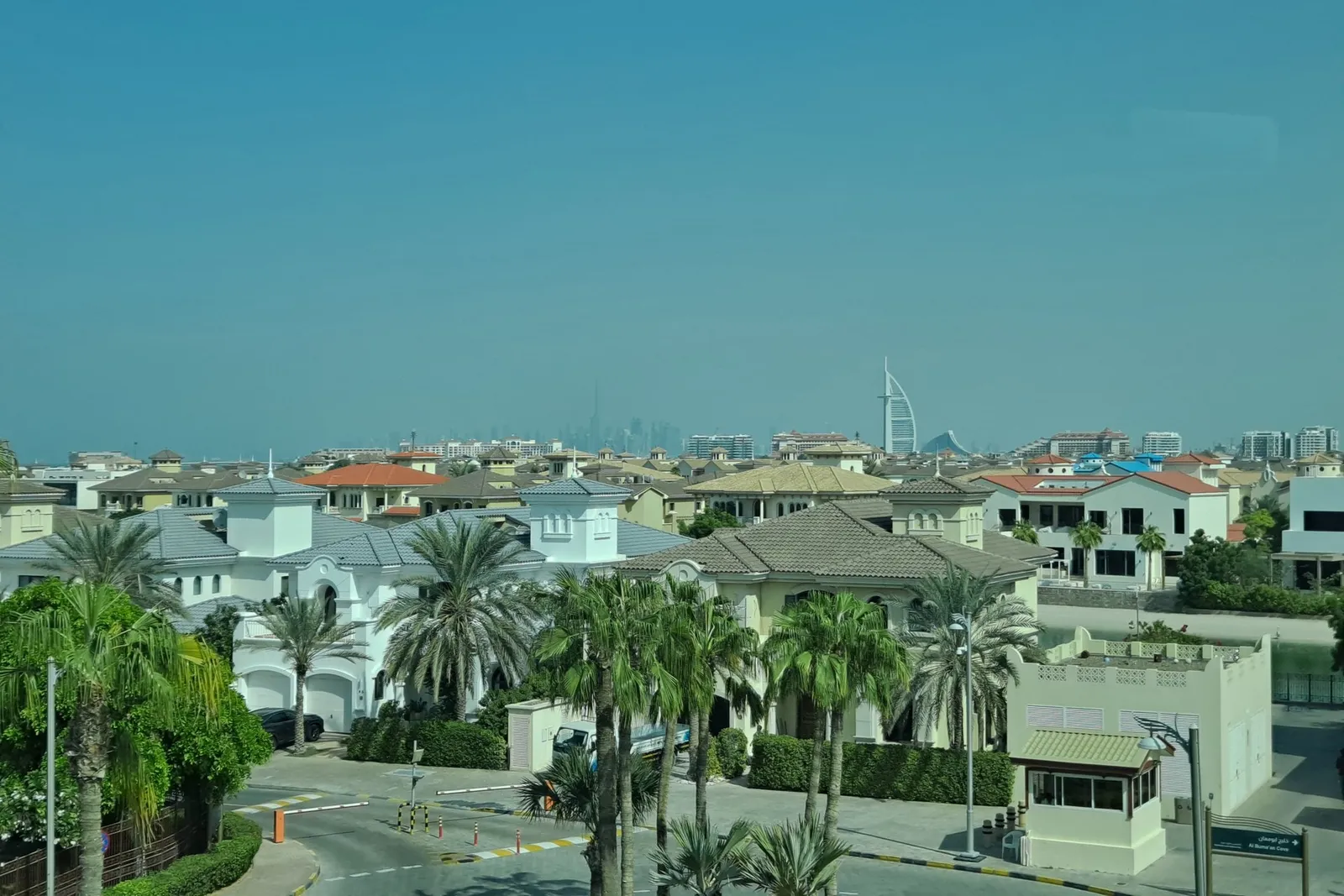 Villas along a frond of Palm Jumeirah, seen from the monorail