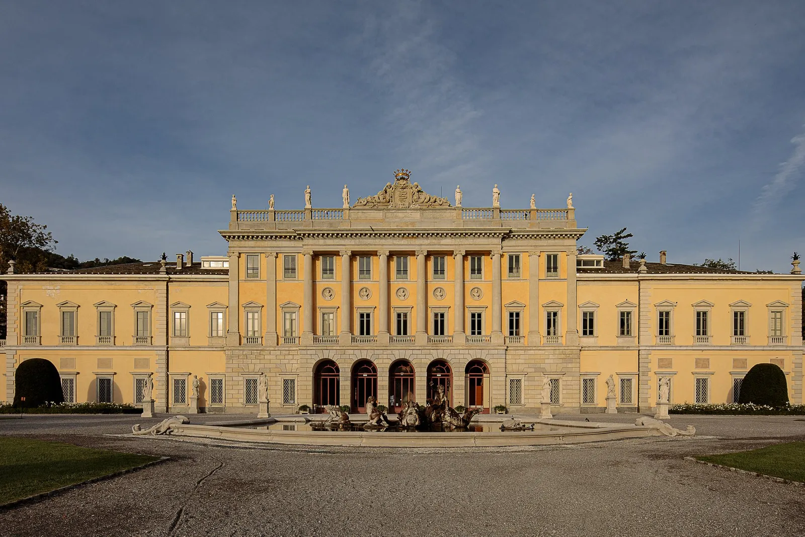 The neoclassical facade of Villa Olmo on the lake at Como