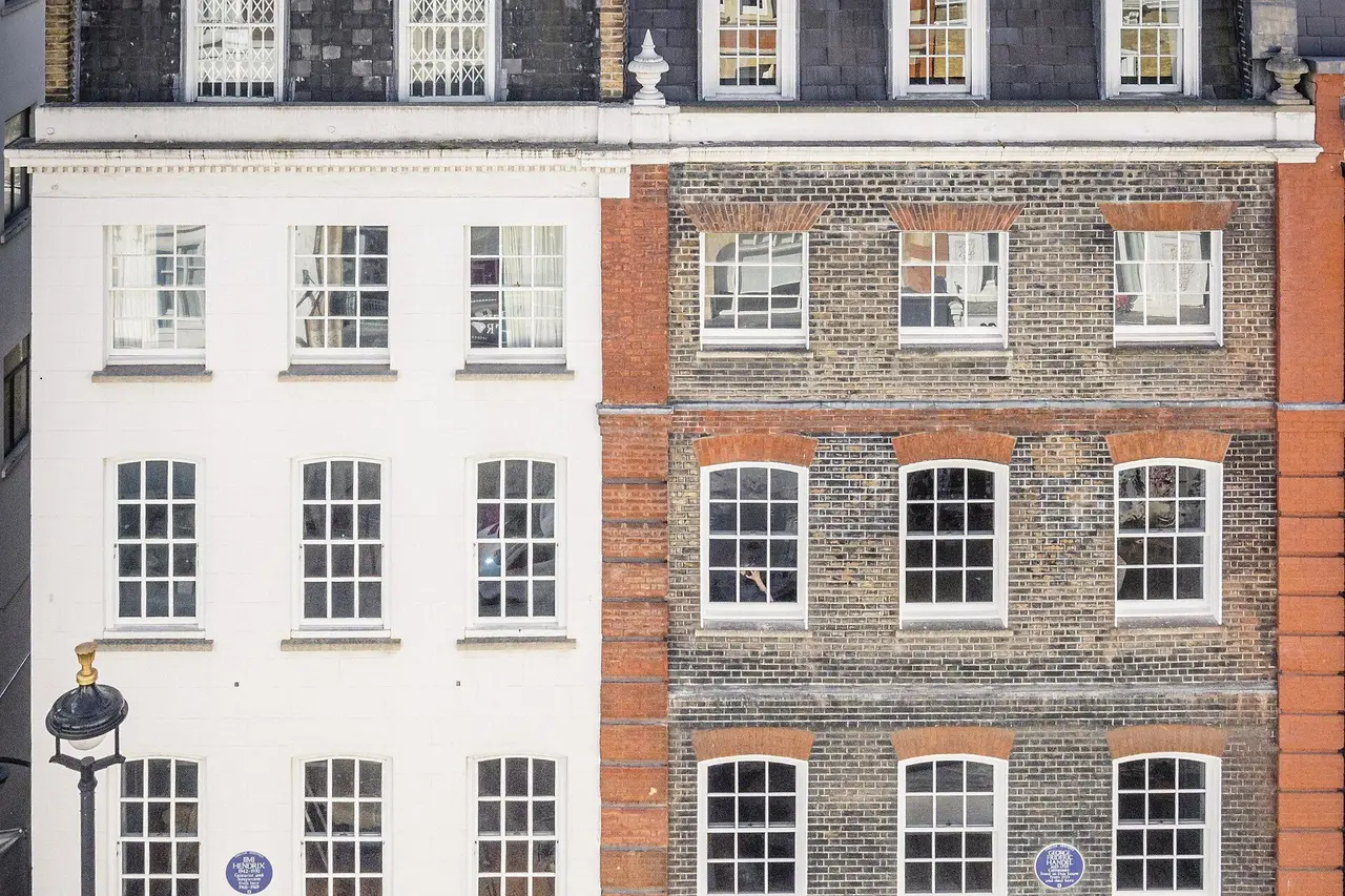 The façade of Handel Hendrix House on Brook Street, brick and coloured doors