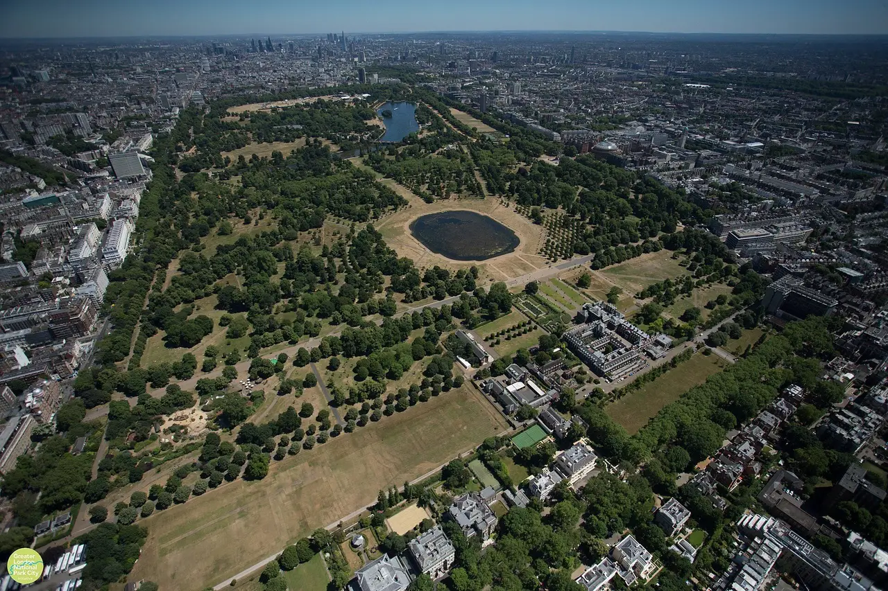 Hyde Park from the air, the Serpentine and tree-lined paths in the middle of the city