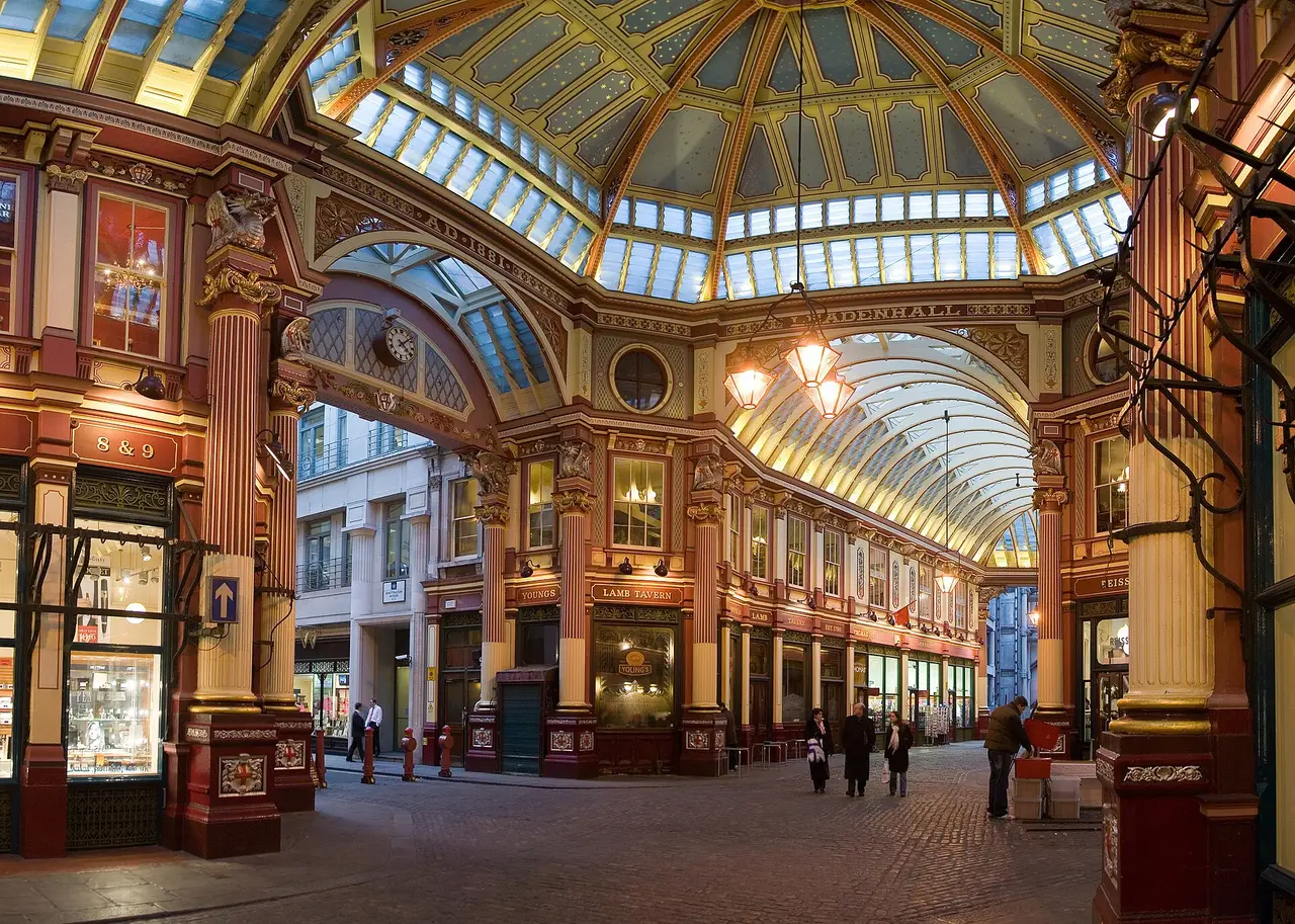 Leadenhall Market: the Victorian arcade with its glass roof, red and gold columns and shopfronts