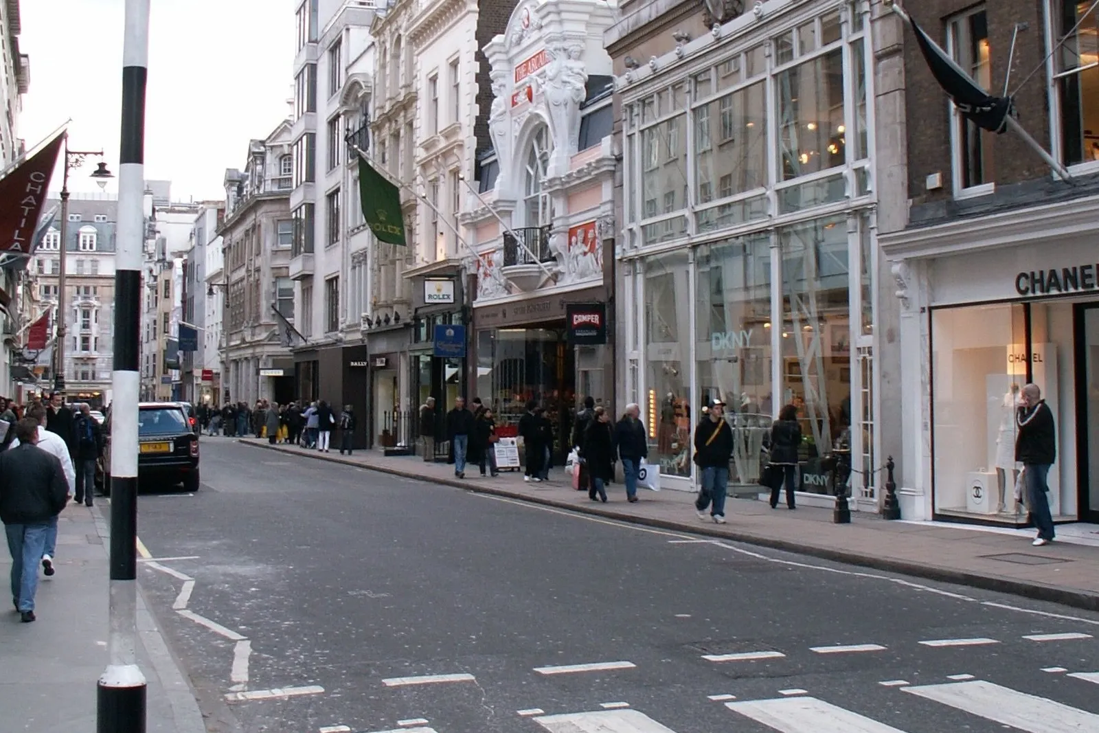 Old Bond Street with the fashion houses’ windows and stone buildings