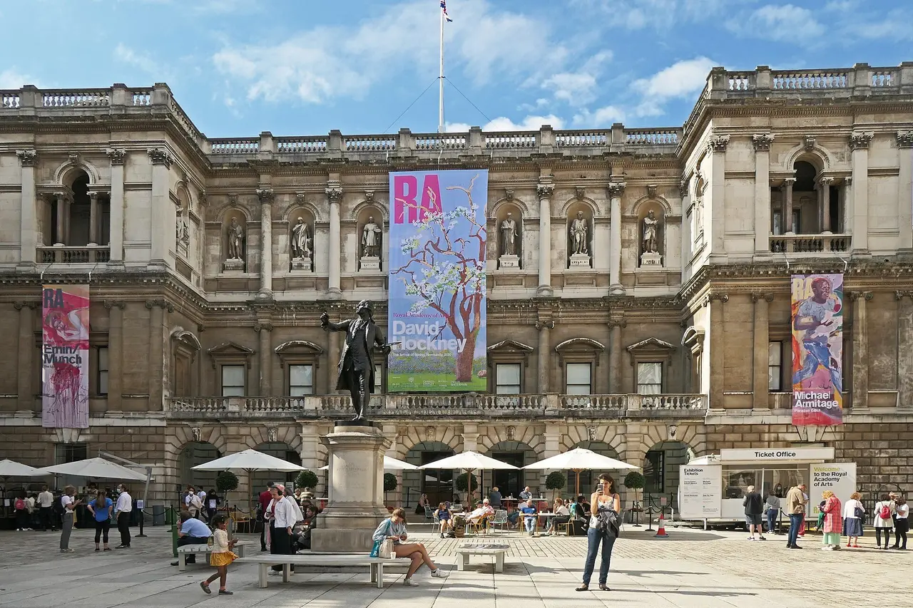 The courtyard of the Royal Academy of Arts at Burlington House, with exhibition banners