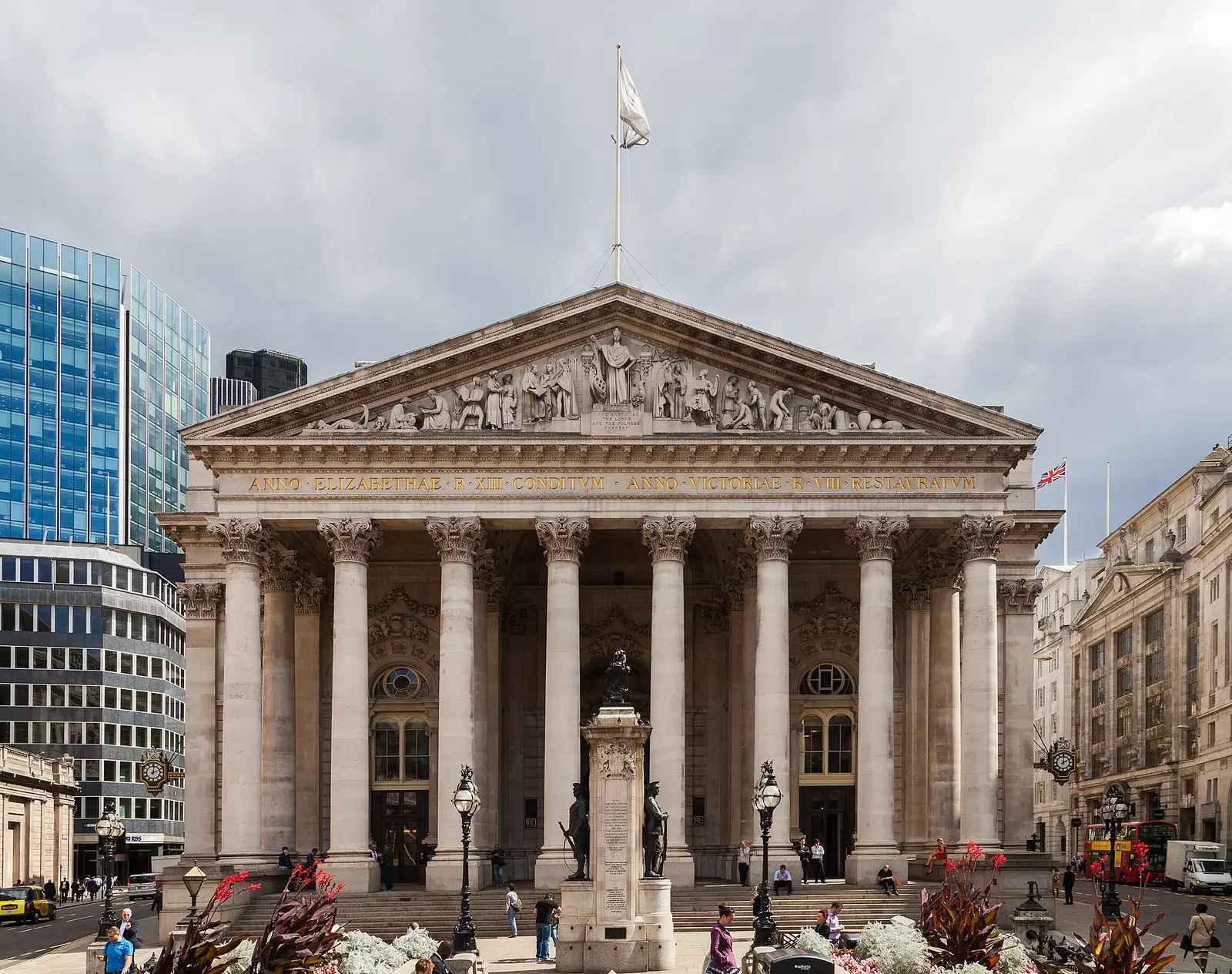 The Royal Exchange’s columned portico and carved pediment under a grey sky