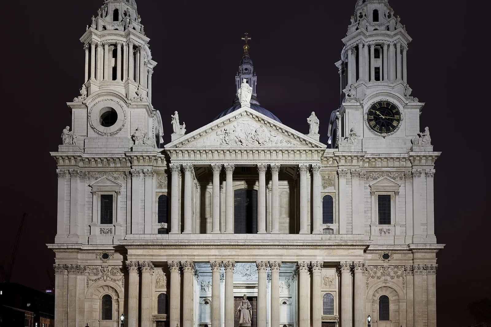 St Paul’s west front at night, its 2 towers lit