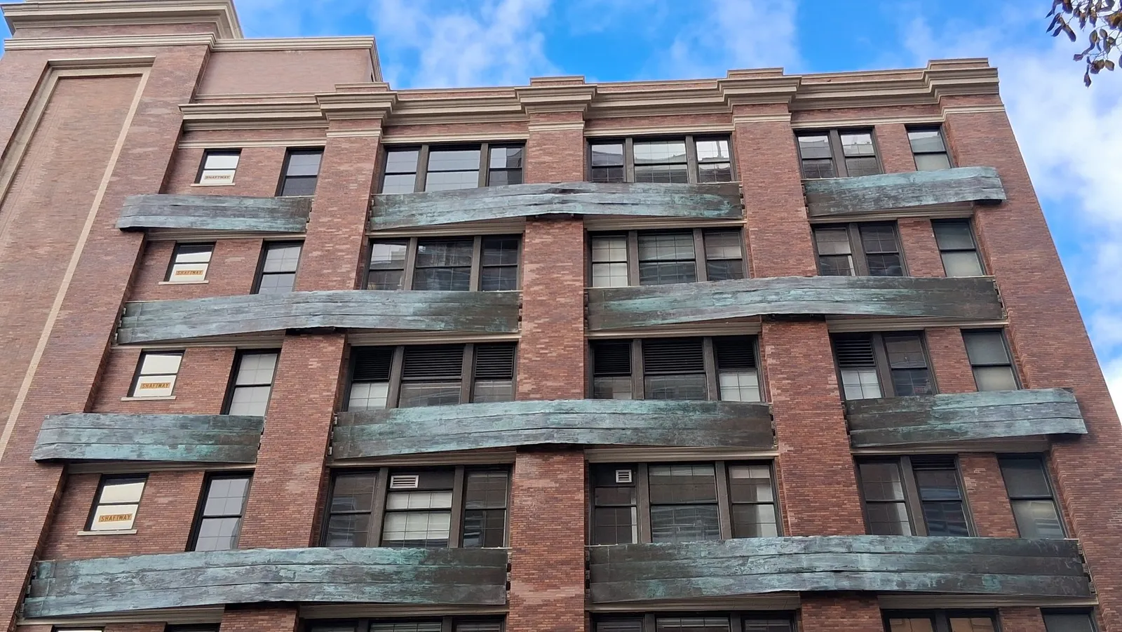 The Chelsea Market entrance on Ninth Avenue, its brick façade
