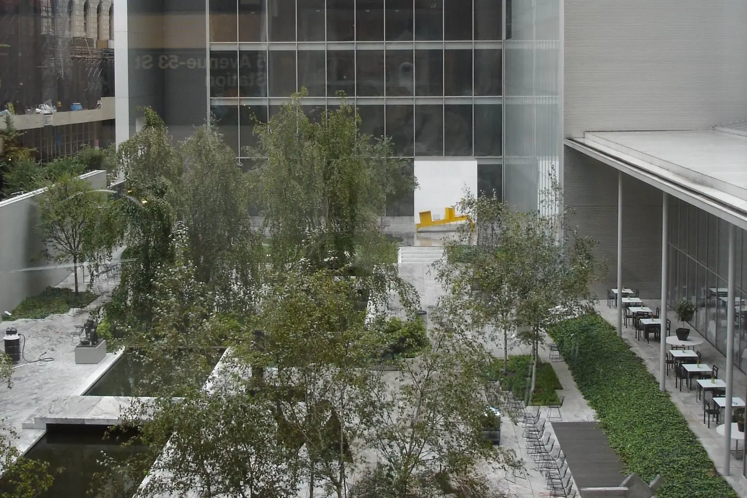 The MoMA sculpture garden from above, between the museum’s glass wings