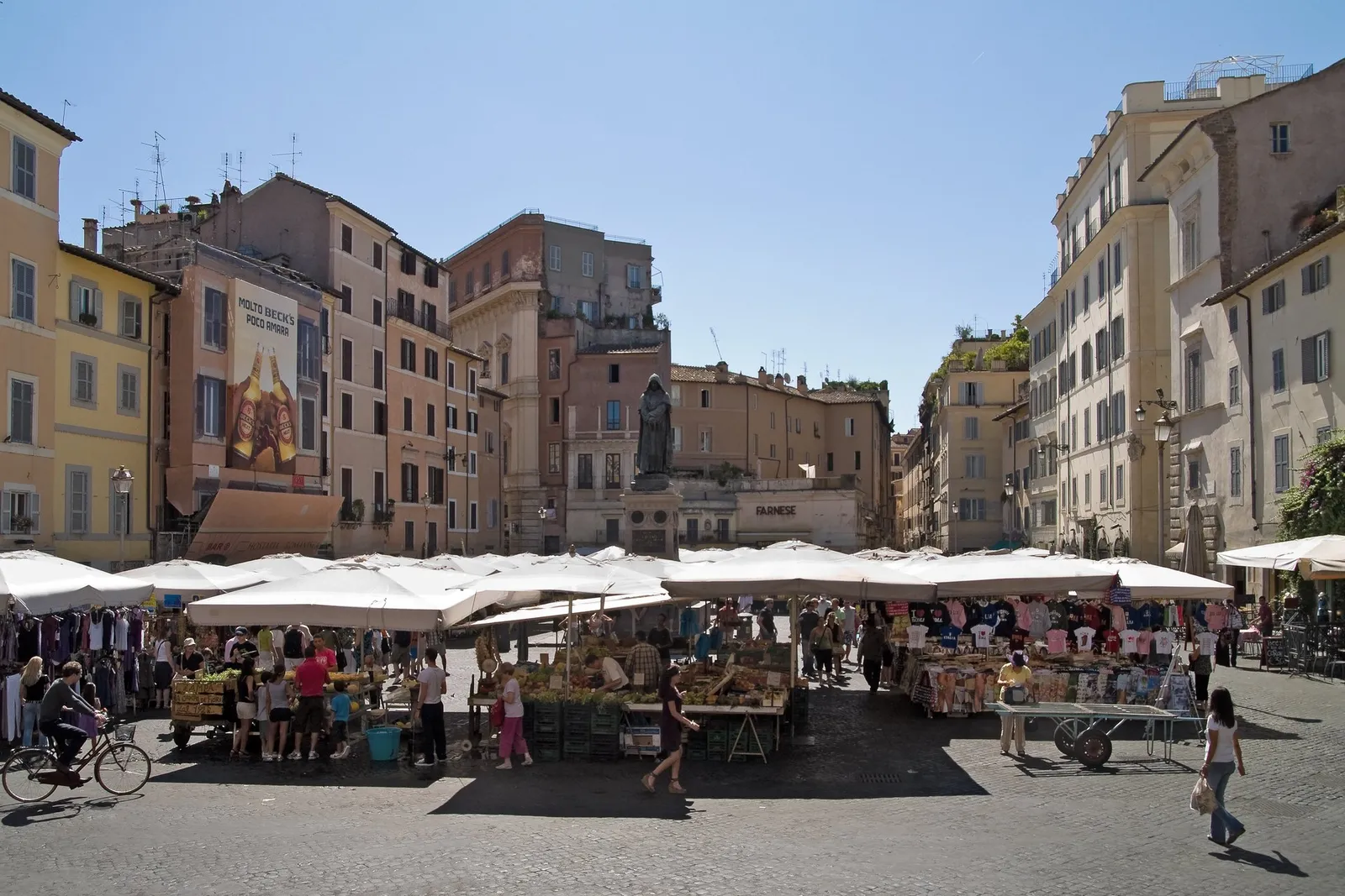 The market stalls of Campo de’ Fiori around the statue of Giordano Bruno