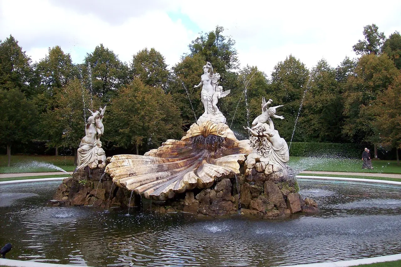 The Fountain of Love, marble figures in a shell basin at the end of the drive