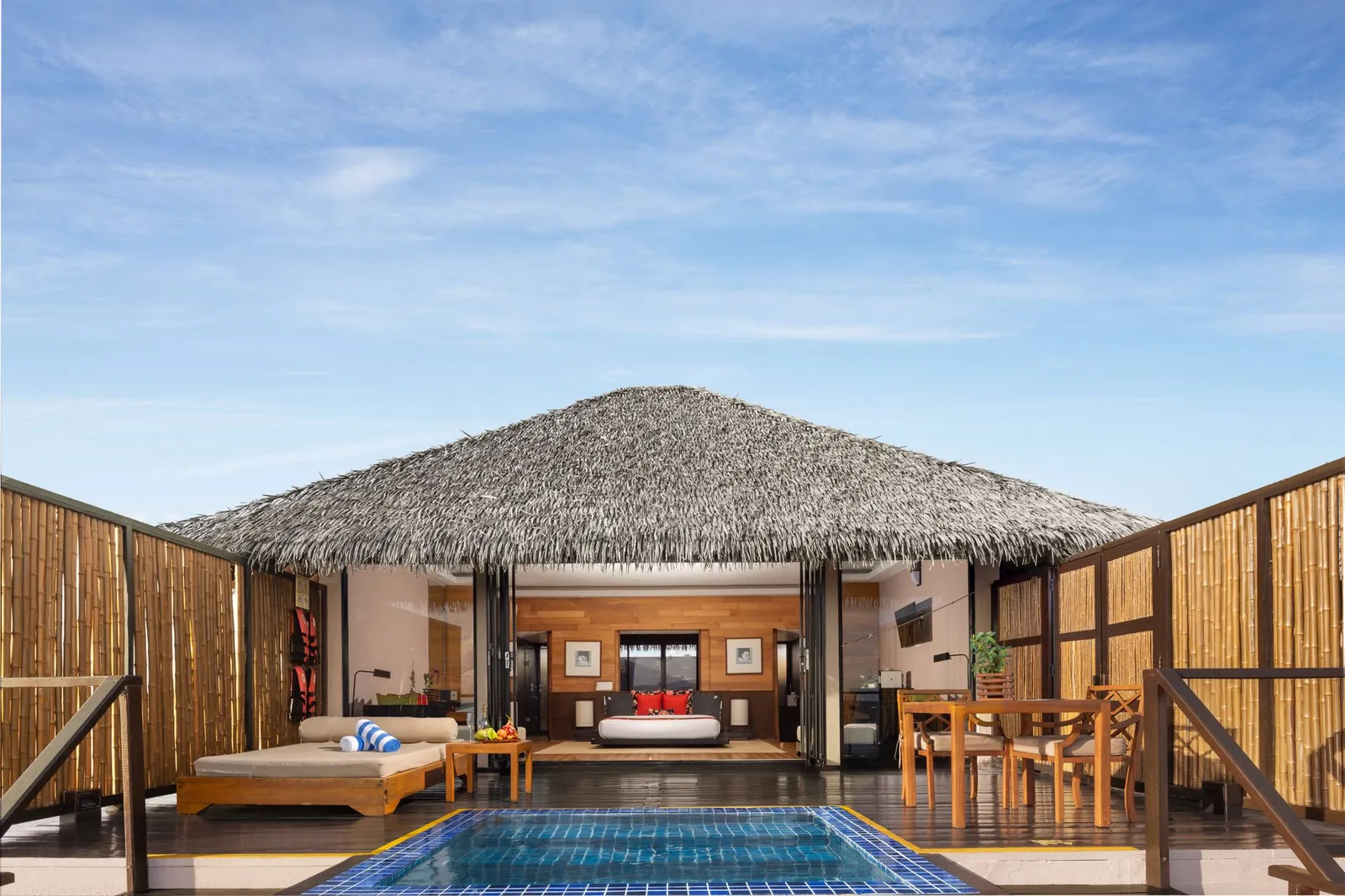 A Honeymoon Villa: the pool in front of its thatched pavilion