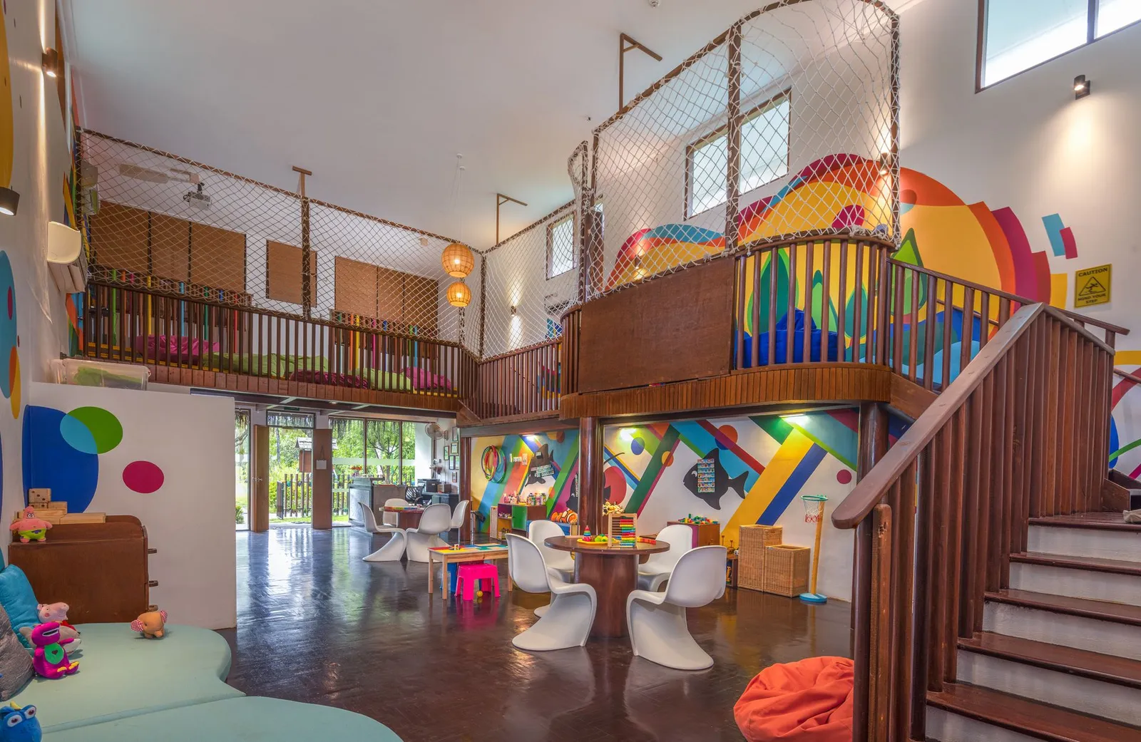 The Koamas Kids Club: a bright room on 2 levels, with its staircase and toys