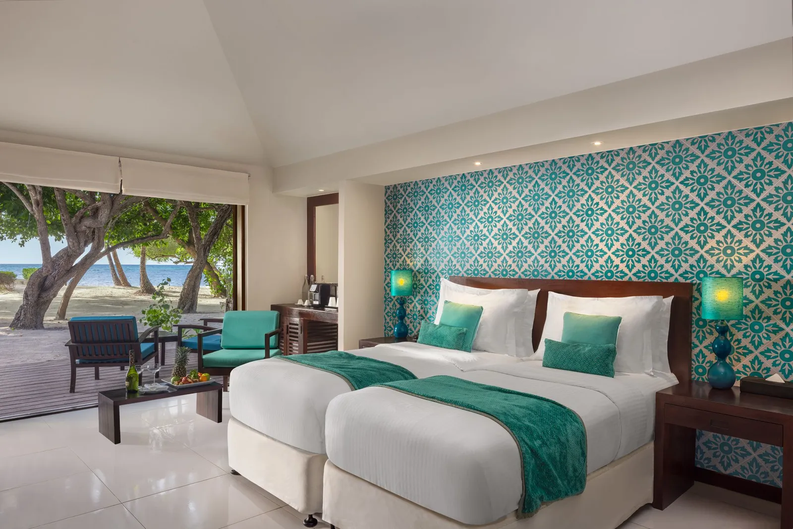 A twin bedroom in a Two Bedroom Sunset Family Beach Villa
