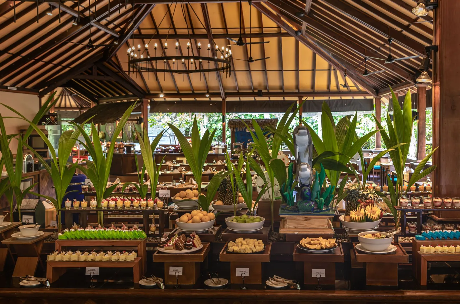 The Jaafaiy buffet under its timber roof, the counters full of dishes