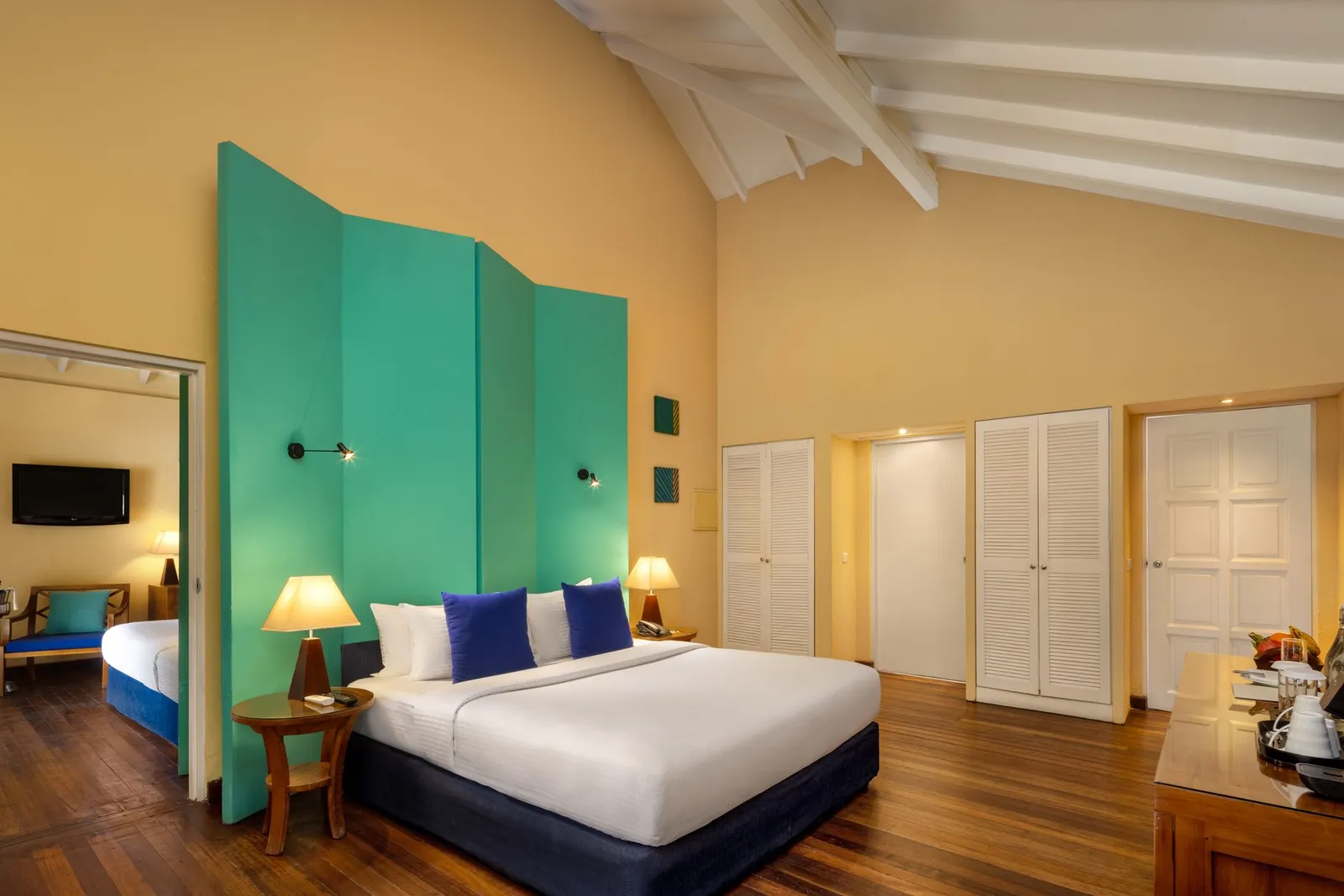 A Two-Bedroom Family Beach Villa: the double bed and the door to the second bedroom