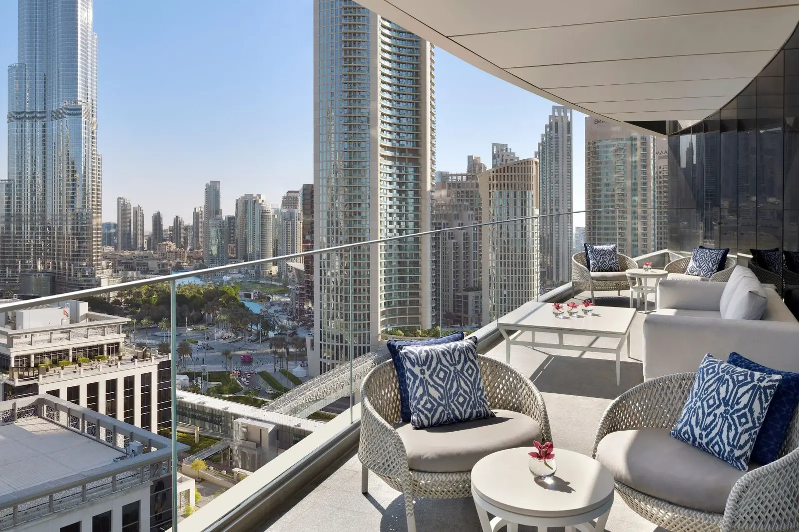 The Club Lounge terrace with sofas and the Downtown skyline