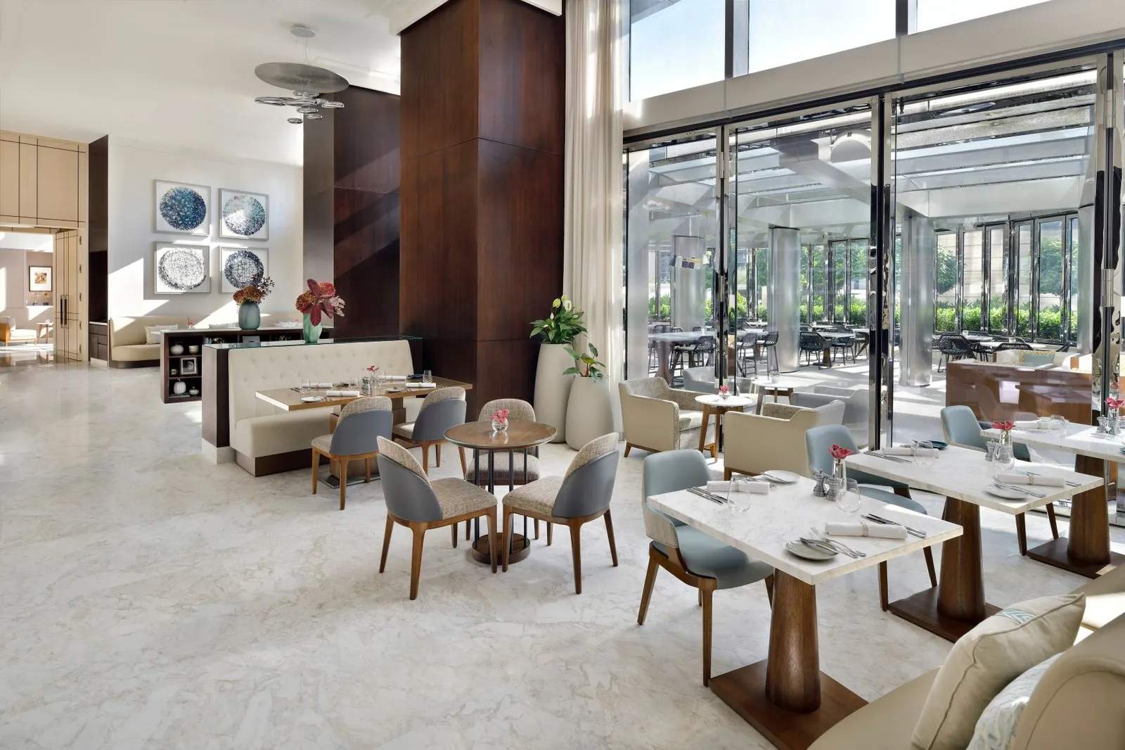 The Restaurant’s dining room with tables and glass onto the garden