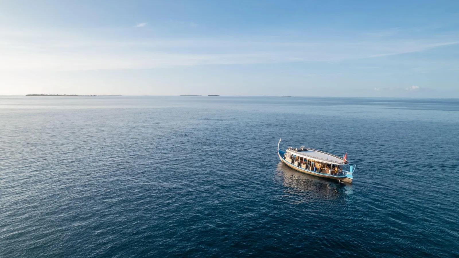 A wooden boat on the sea.