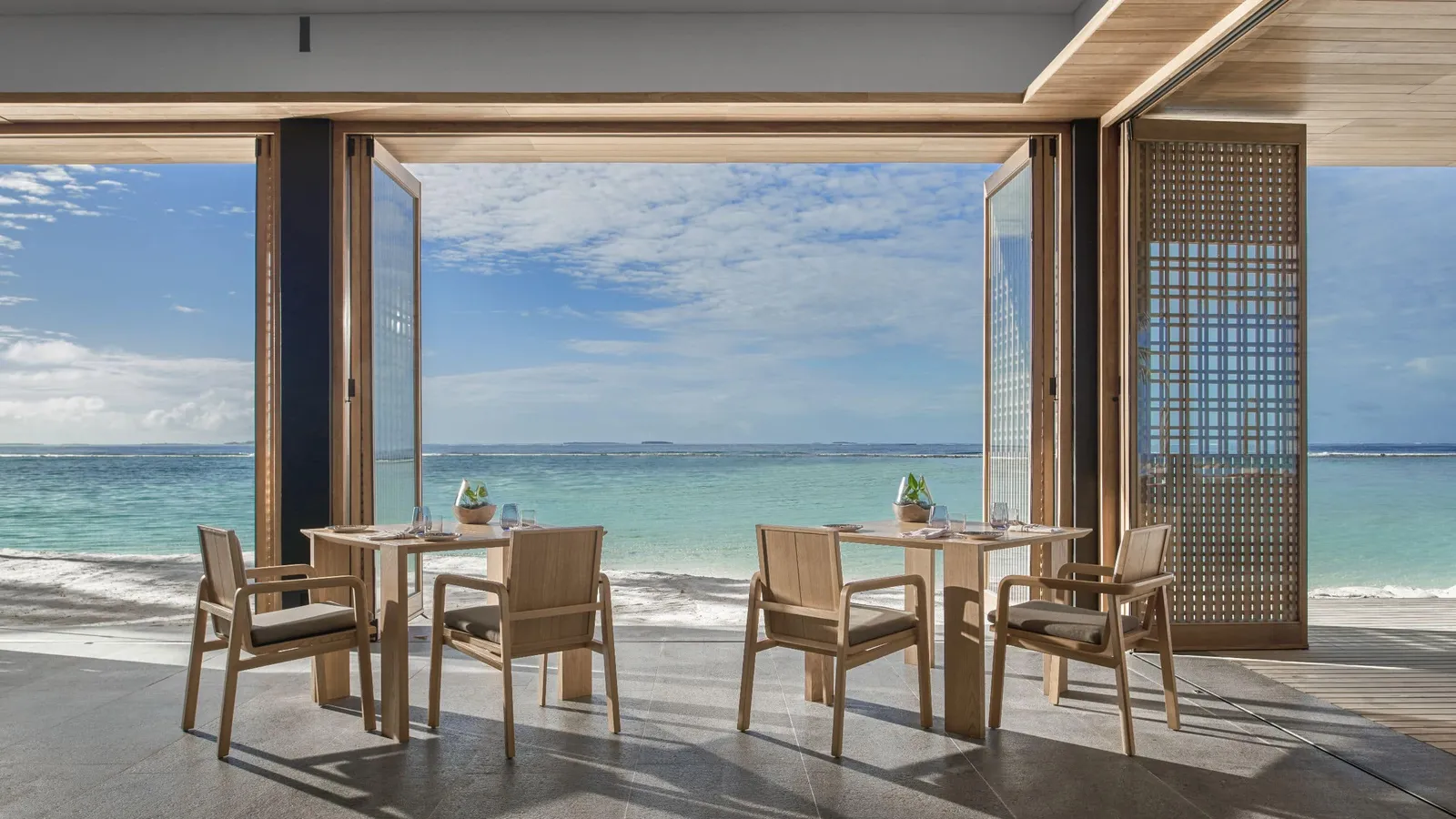 Wooden tables on the beach.