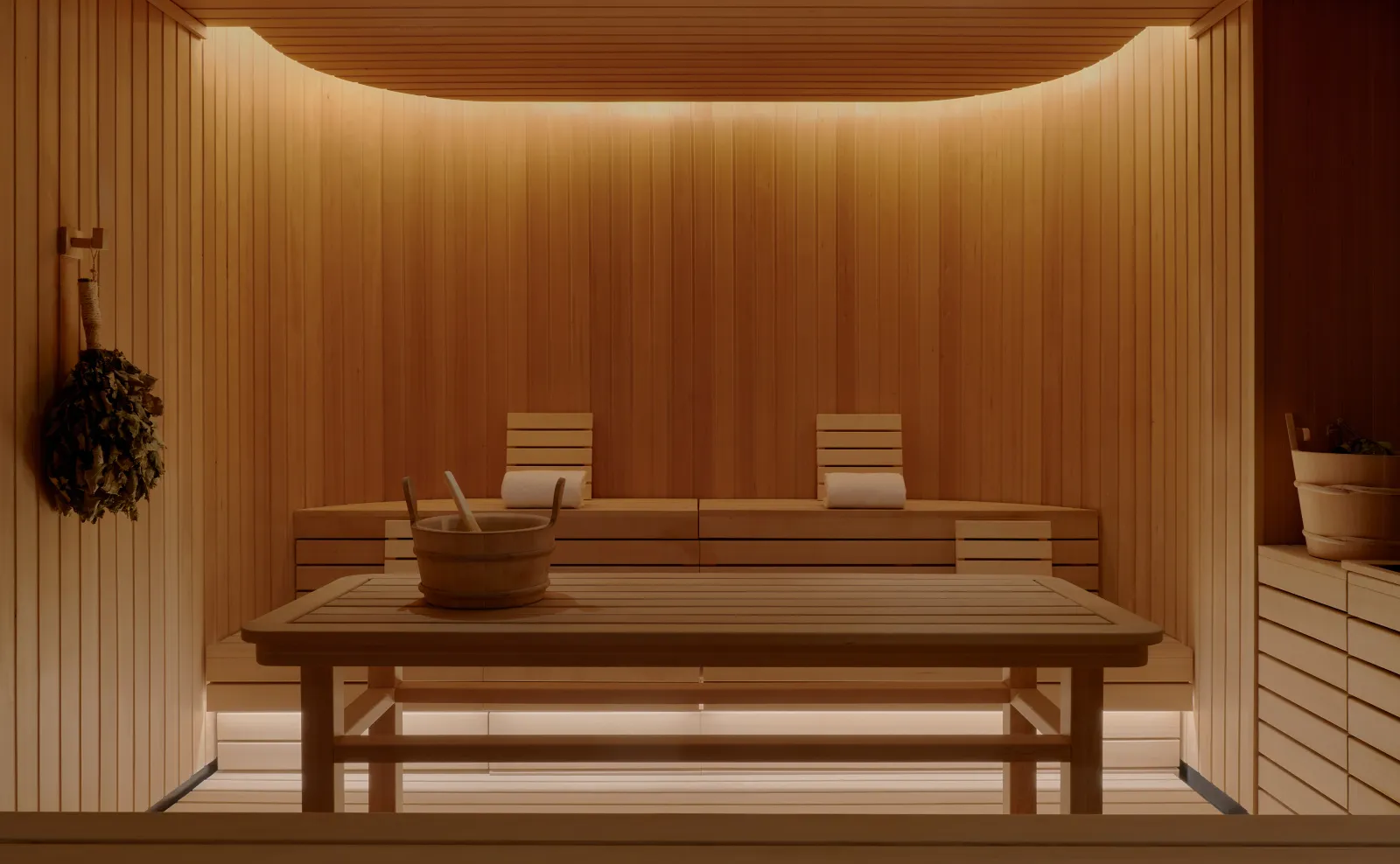 Aman New York’s banya, all in wood, with tiered benches and water buckets