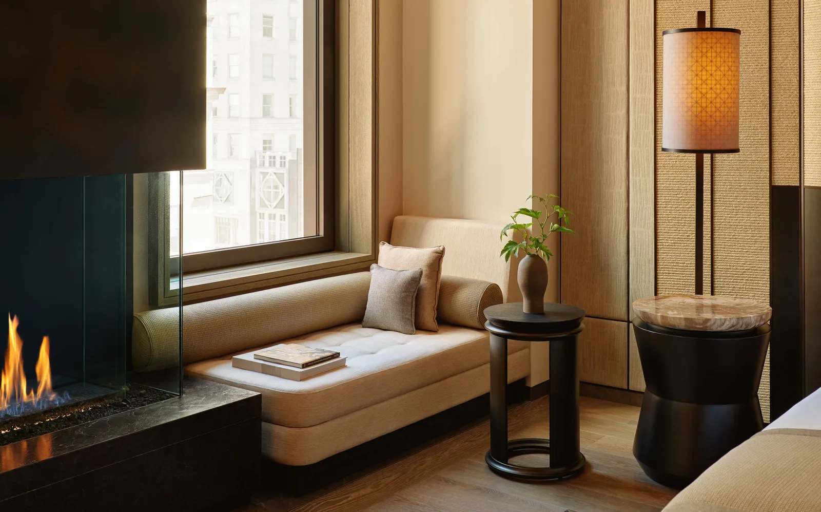 Principal bedroom with window seat overlooking 57th Street at Aman New York.