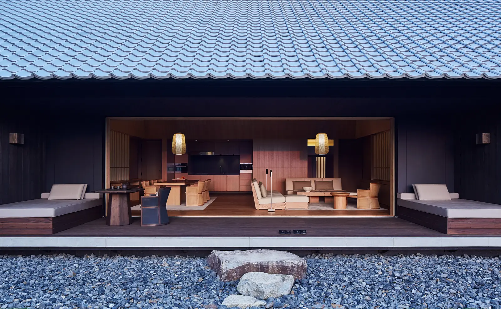 The living pavilion seen from the gravel garden, its sides open