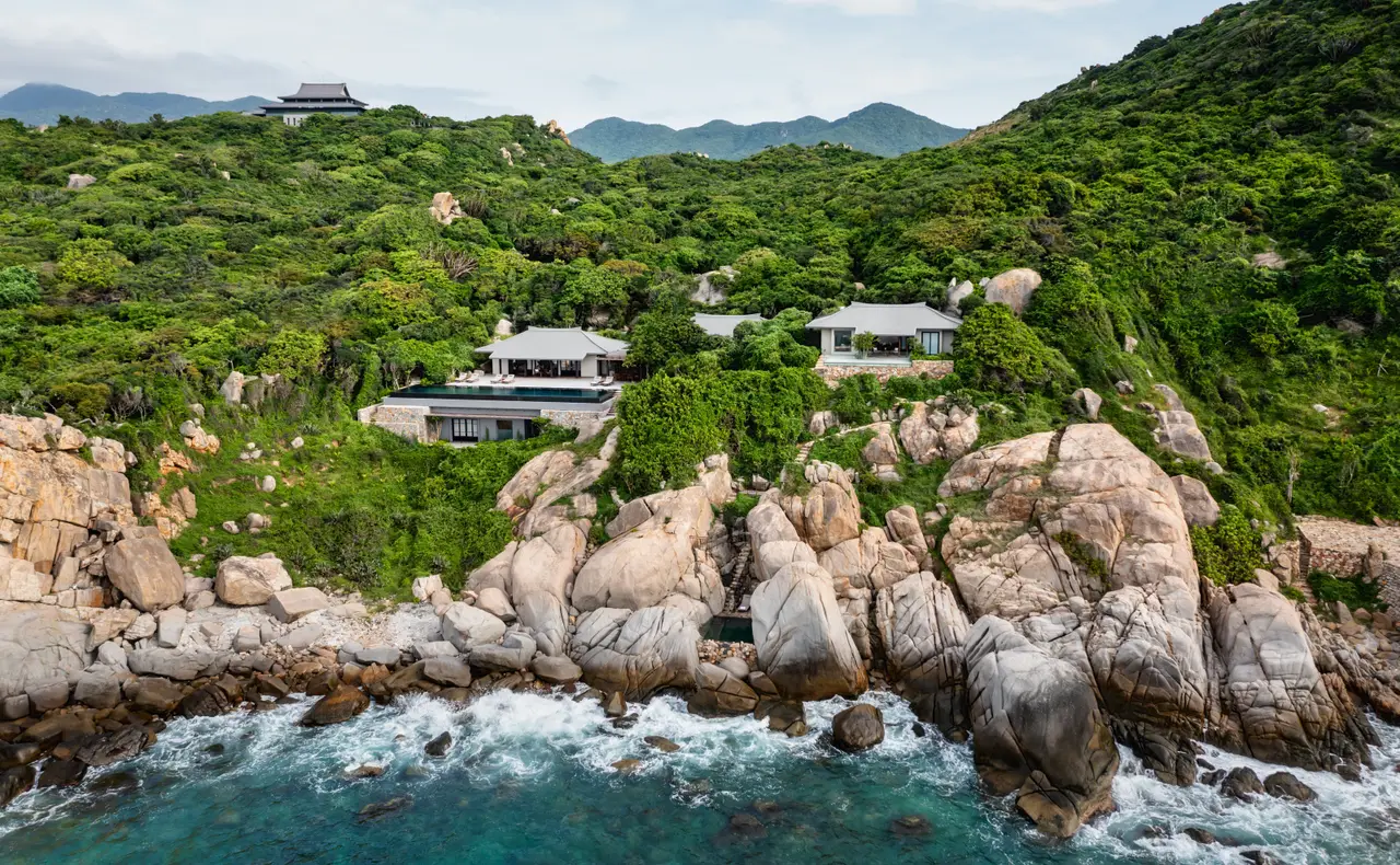 The Three-Bedroom Ocean Pool Family Residence from above, over the rocks and the surf