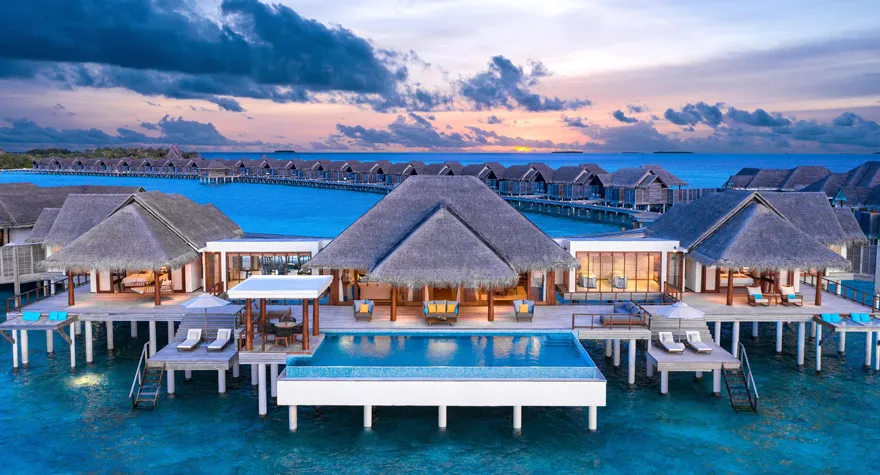 The Two Bedroom Sunset Over Water Pool Residence at sunset, over the water