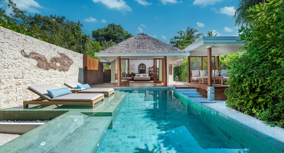 A Beach Pool Villa: the pool before its pavilion and loungers
