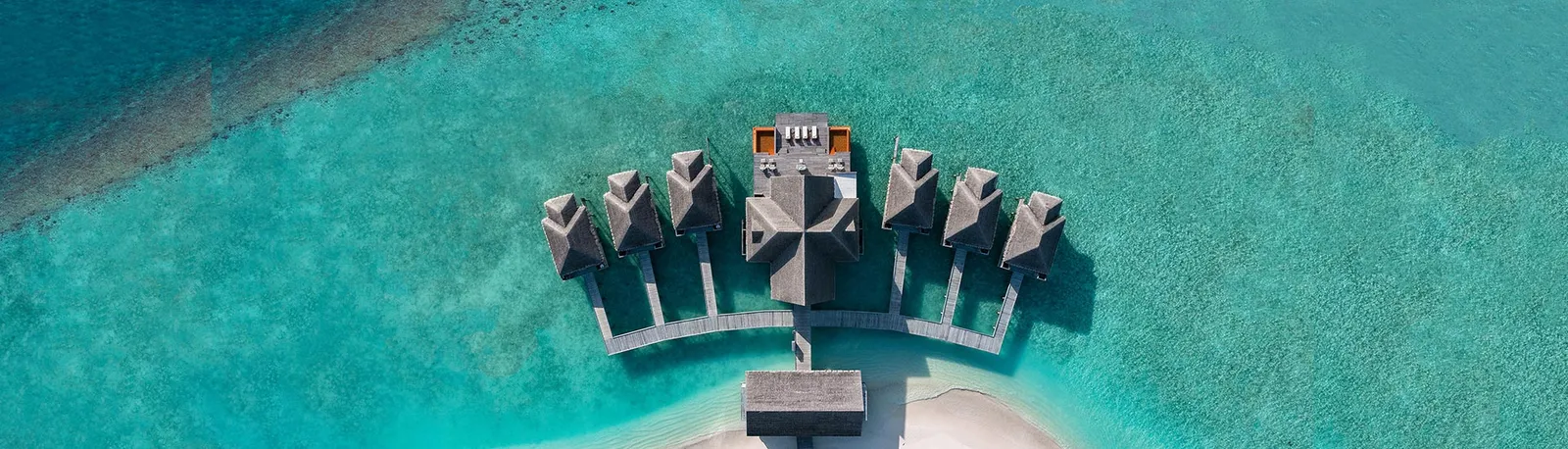 The overwater spa from the air, fanned out over the lagoon