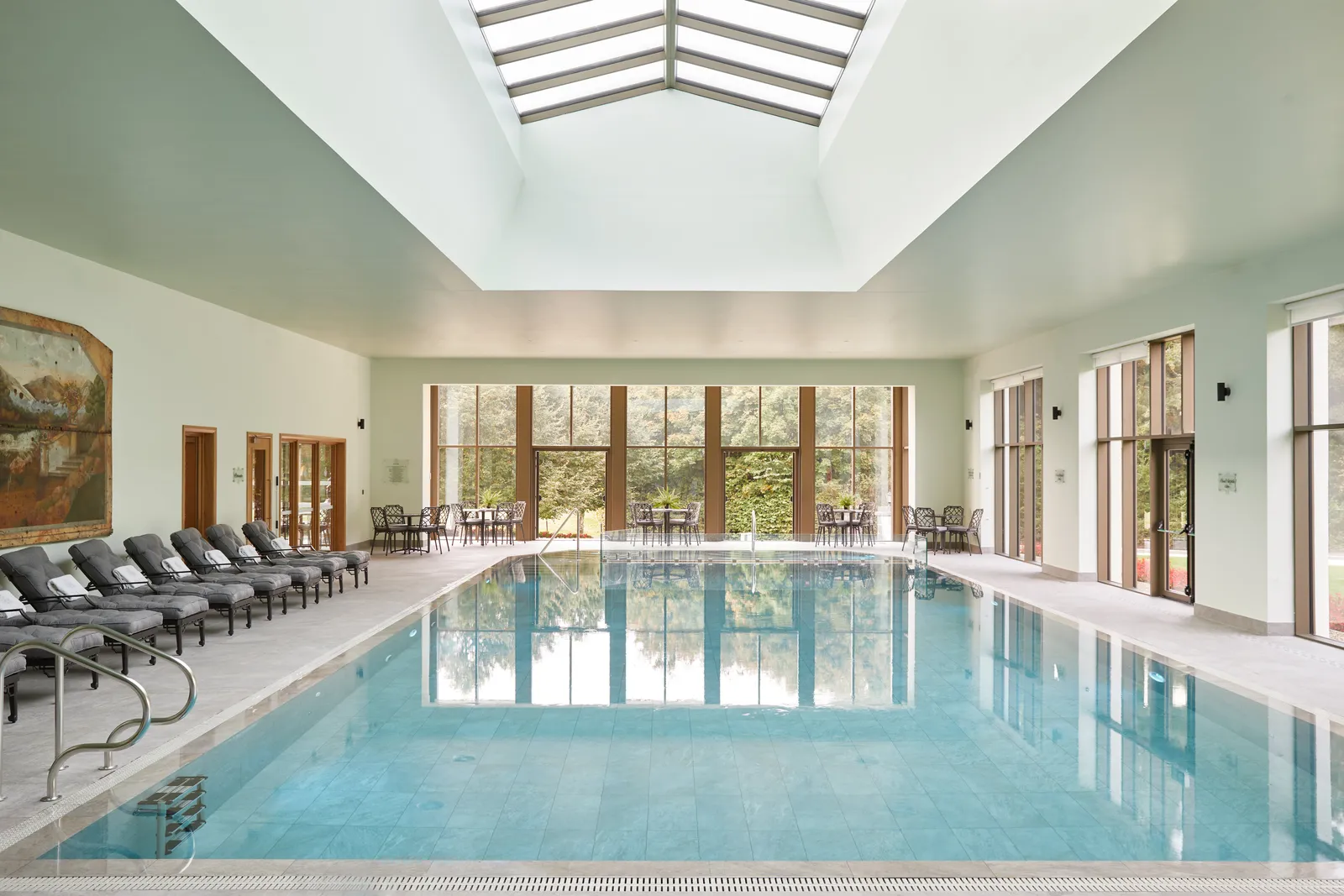 Éalú’s 15-metre pool under the skylight, with loungers along the glass wall