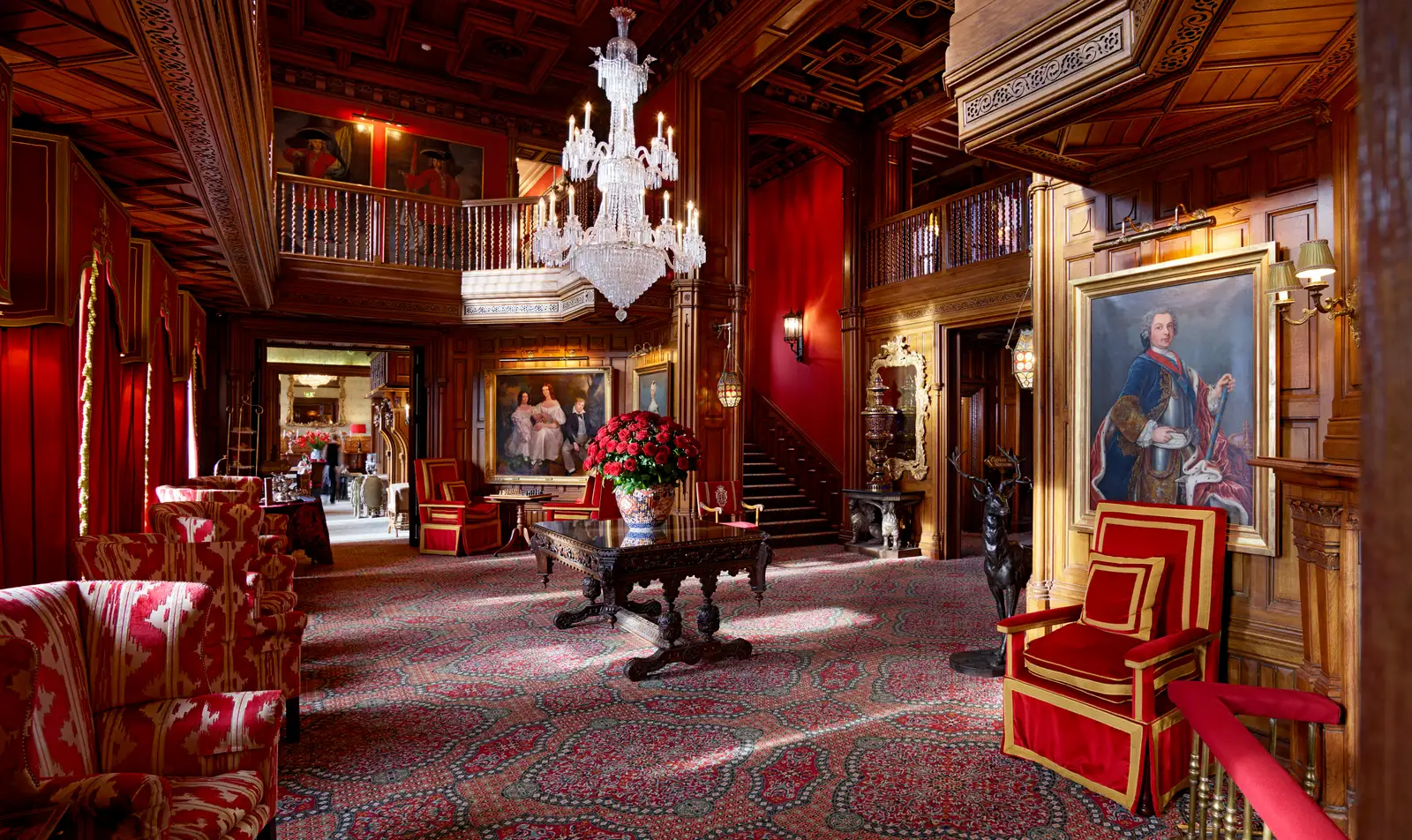 The Oak Hall: oak panelling, the chandelier and the gallery above