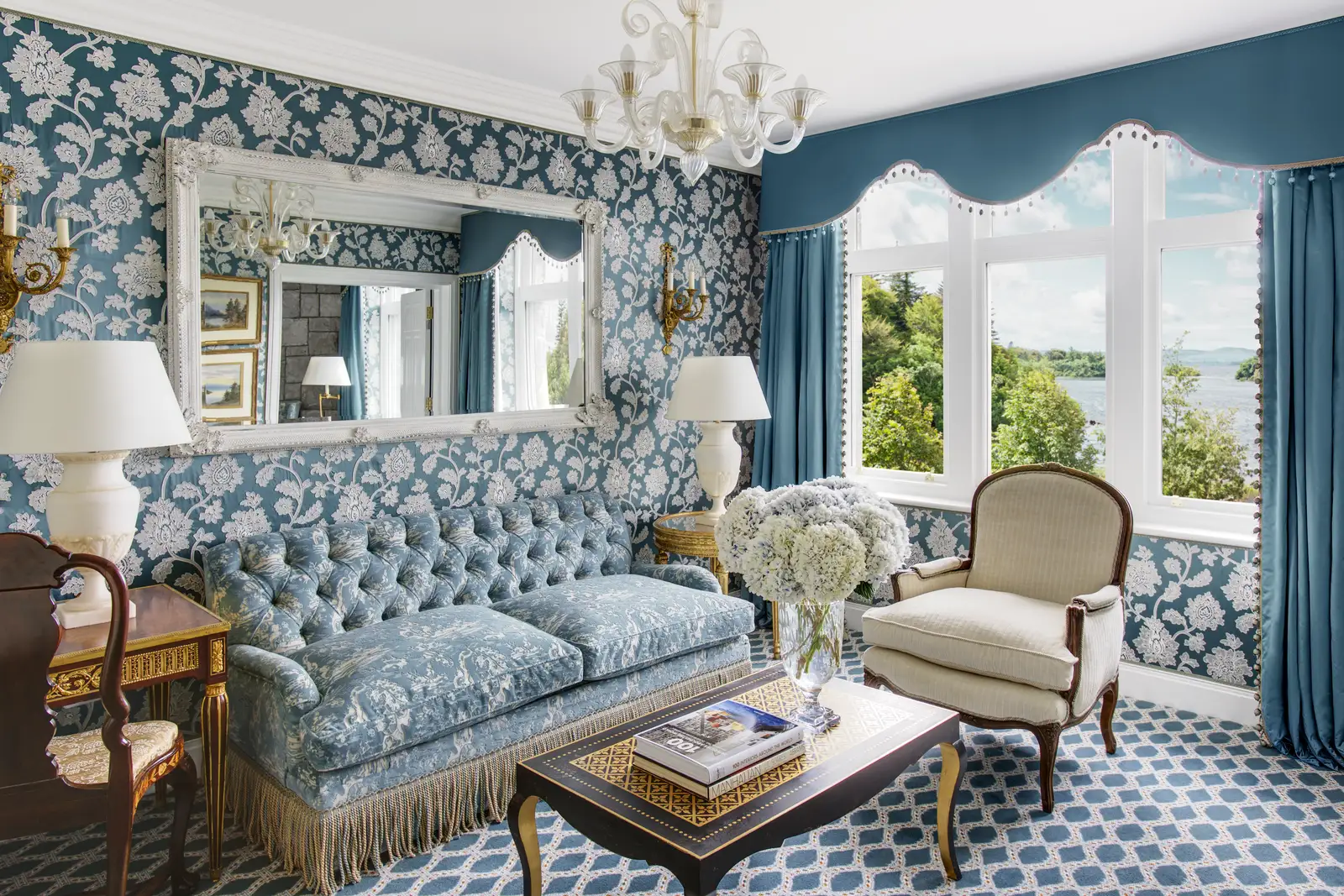 A Suite’s sitting room: a buttoned sofa and a window over Lough Corrib