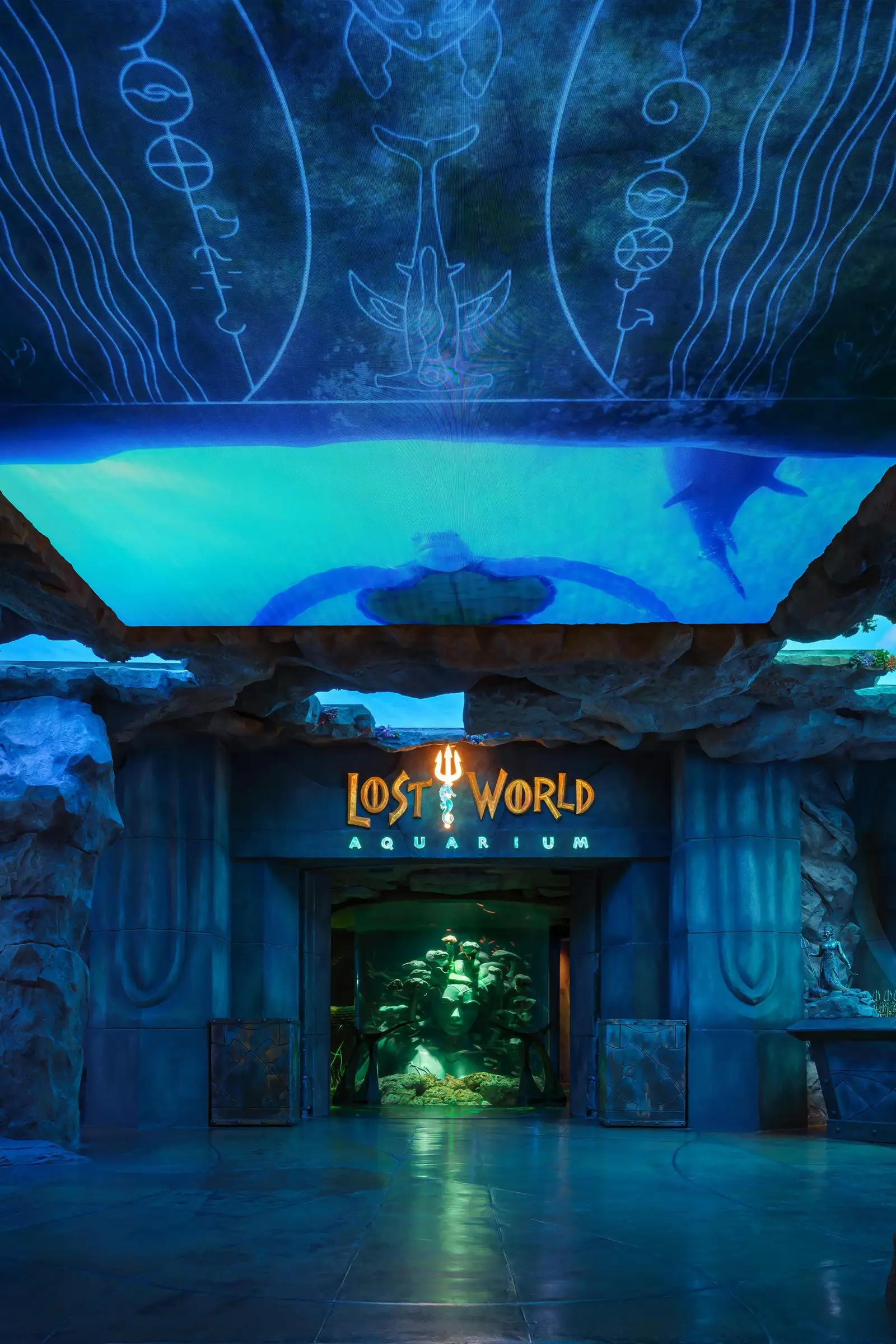 The blue entrance of the Lost World Aquarium