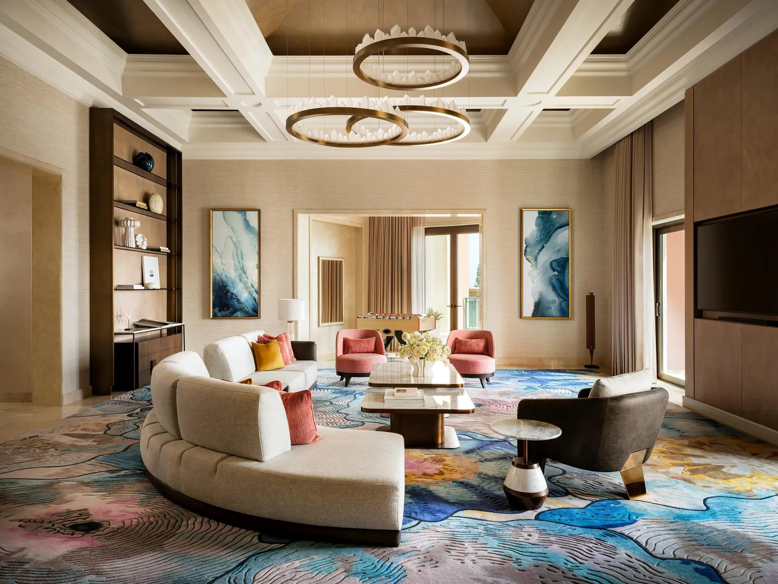 The Grand Atlantis Suite’s large living room with curved sofas