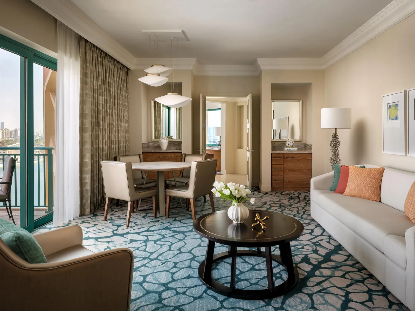A Skyline Suite living room with a dining table
