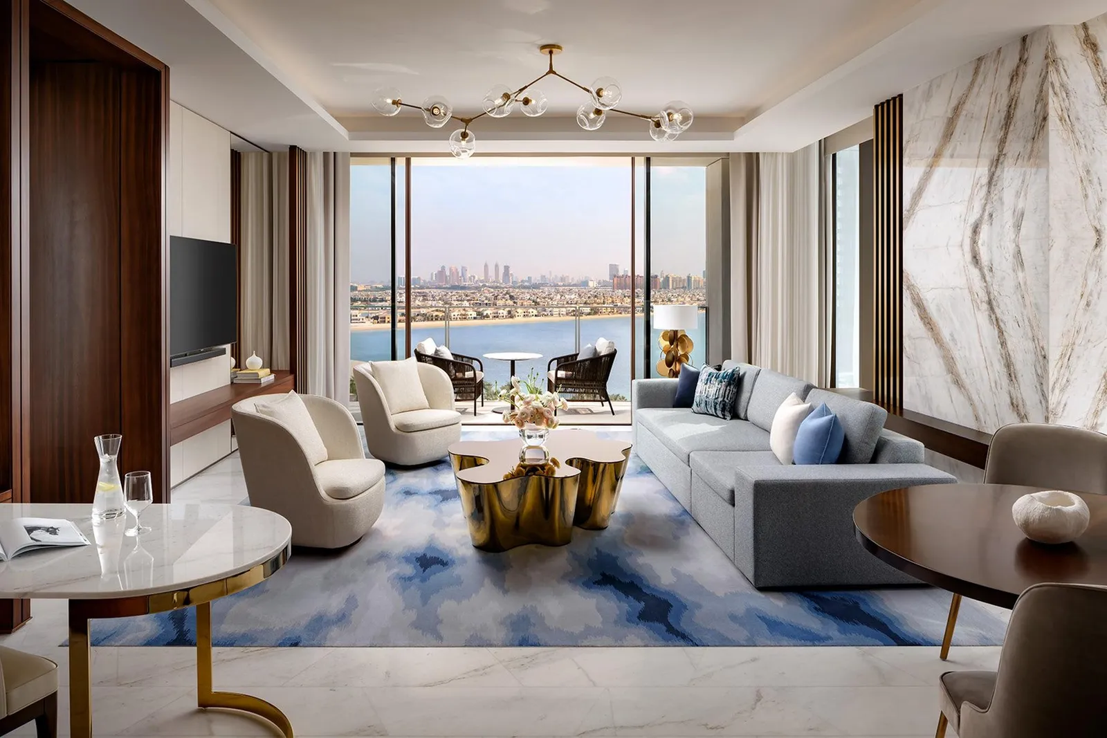 A Sky Terrace Suite living room with sofas and a view