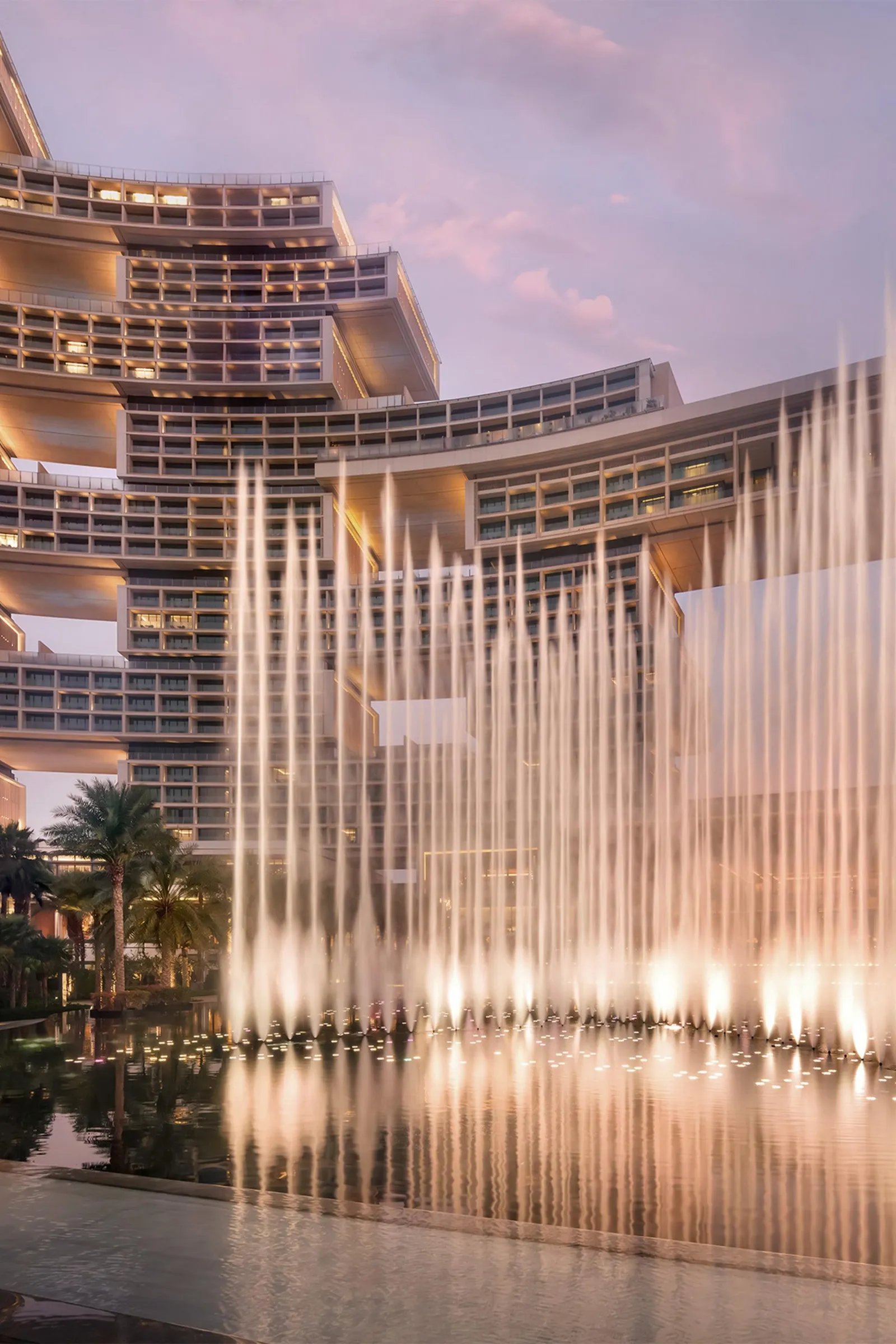 The Skyblaze fountain in front of the tower at dusk