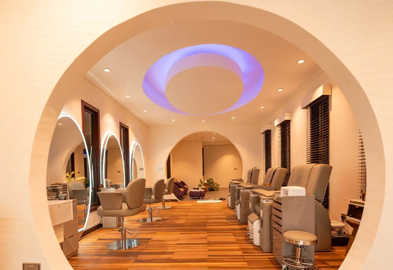 The Essens spa salon, its chairs beneath a white arch