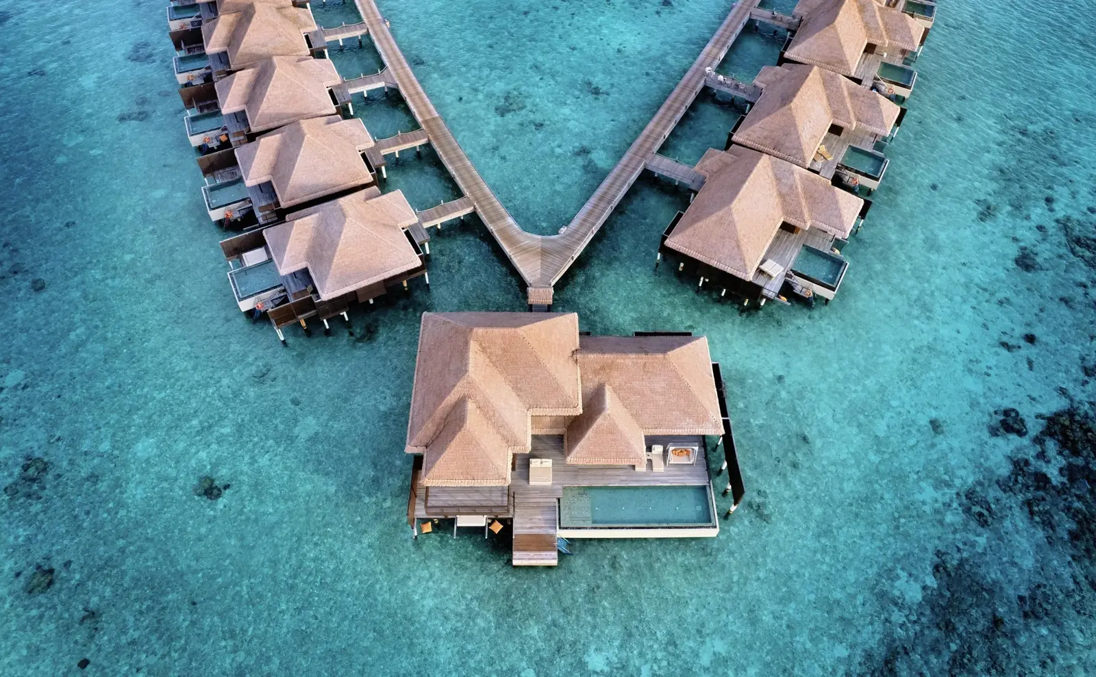 The Royal Ocean Suite from the air, at the end of the jetty between 2 arcs of villas