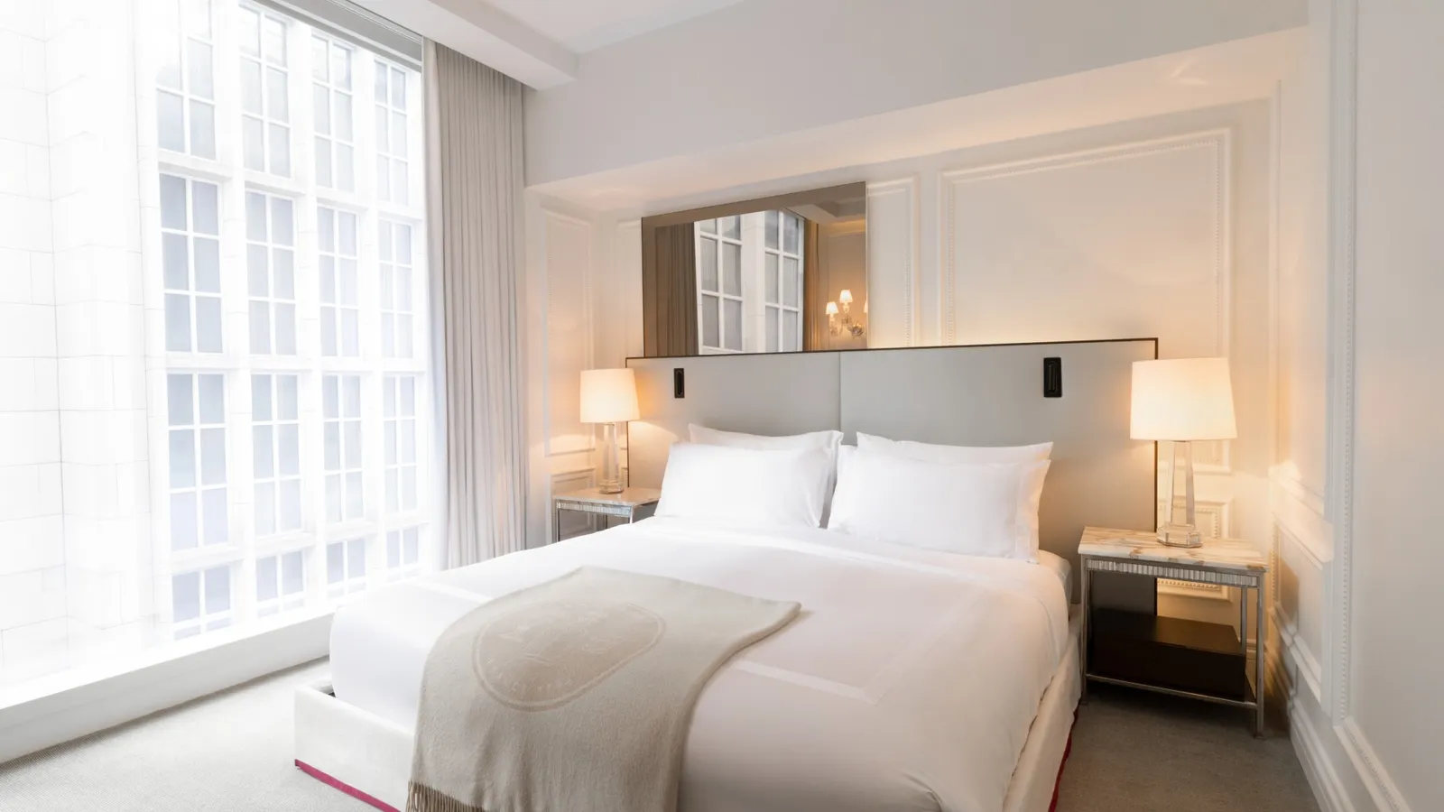 Illustration published for the Harcourt Two-Bedroom King Suite: it shows a single king room; the exact 2-bedroom interior is unknown.