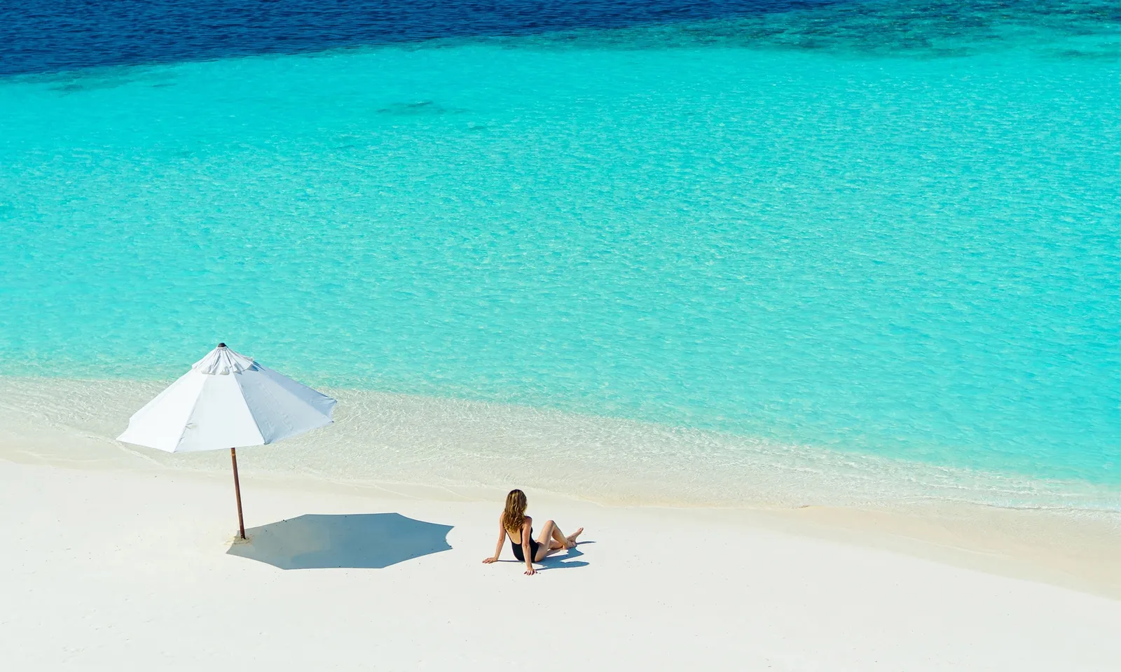 Maagau’s beach in the official resort photograph