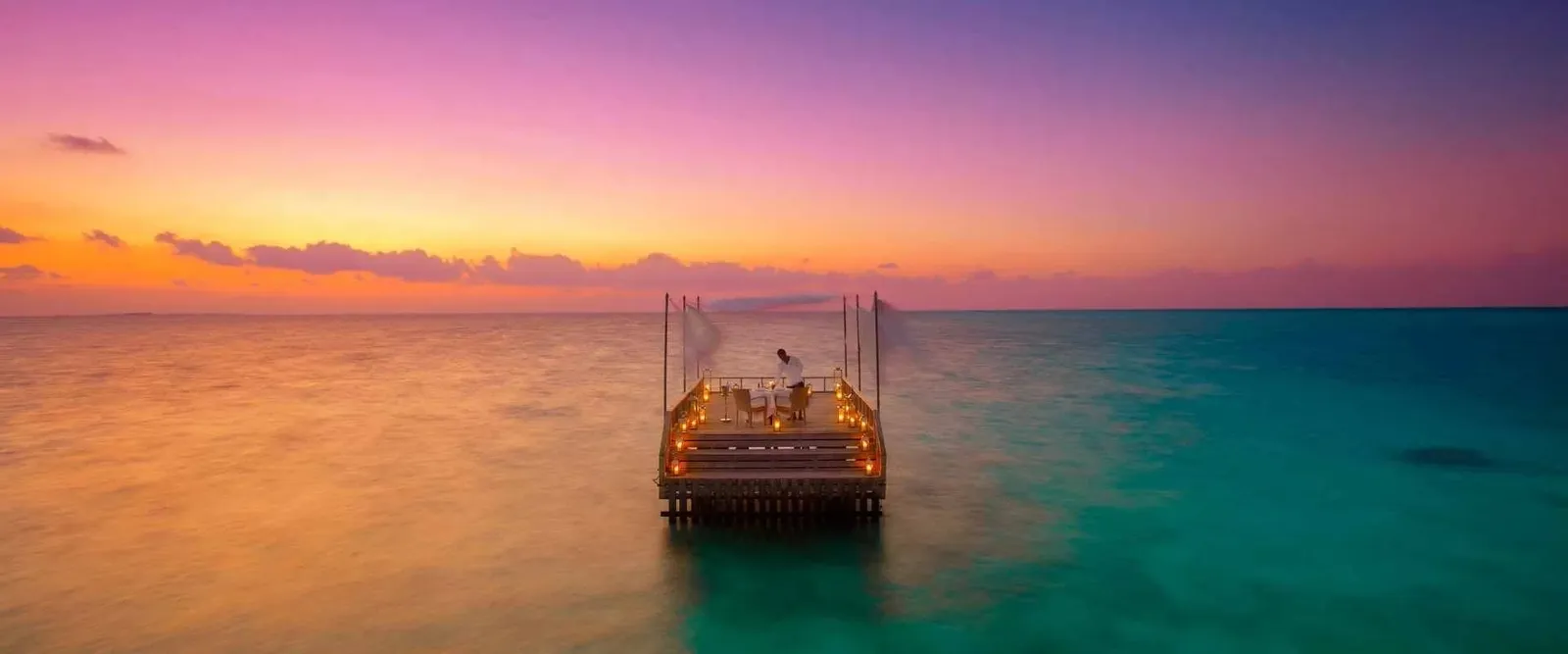 Dinner on the Piano Deck at sunset, out at sea