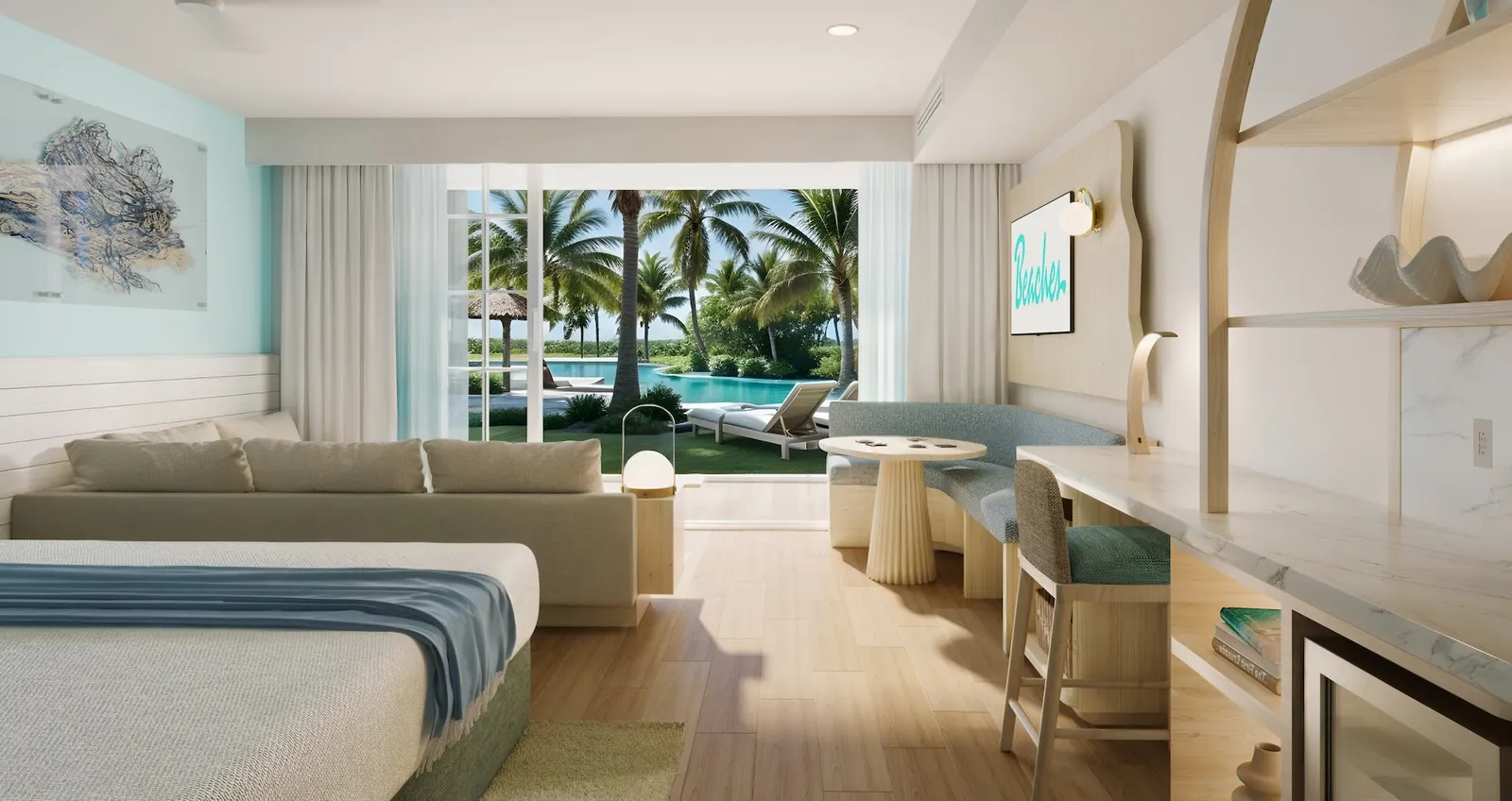 A ground-floor room with the bed, a long sofa and the door open onto palms and the pool.