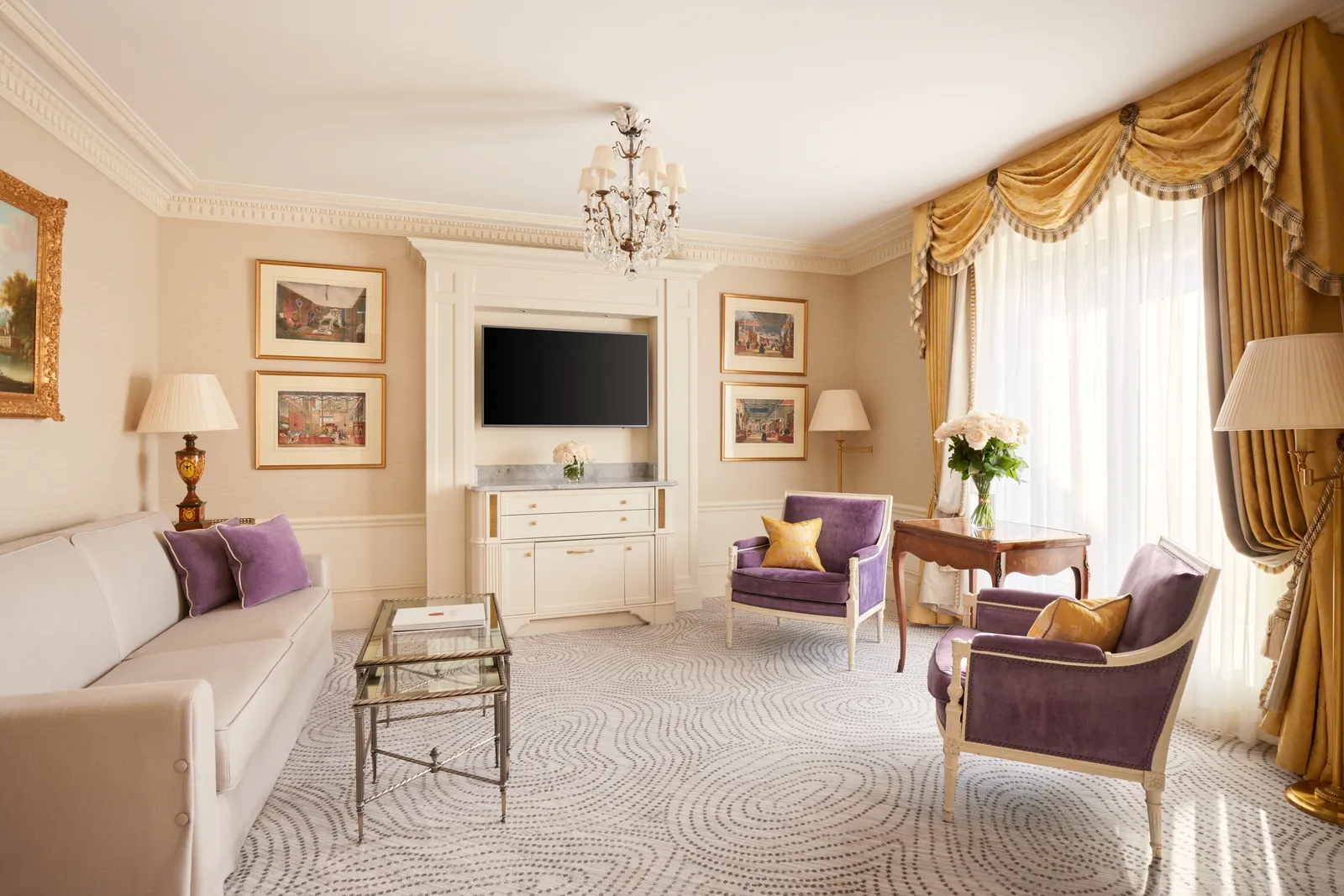 The Beau-Rivage Suite living room, with purple armchairs