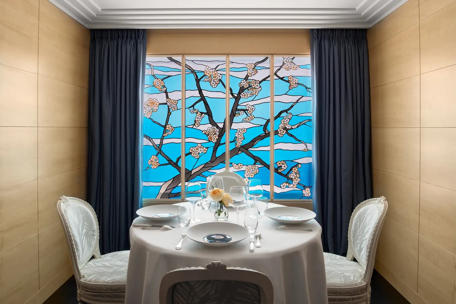 The Imperial Suite dining room, with its painted glass window