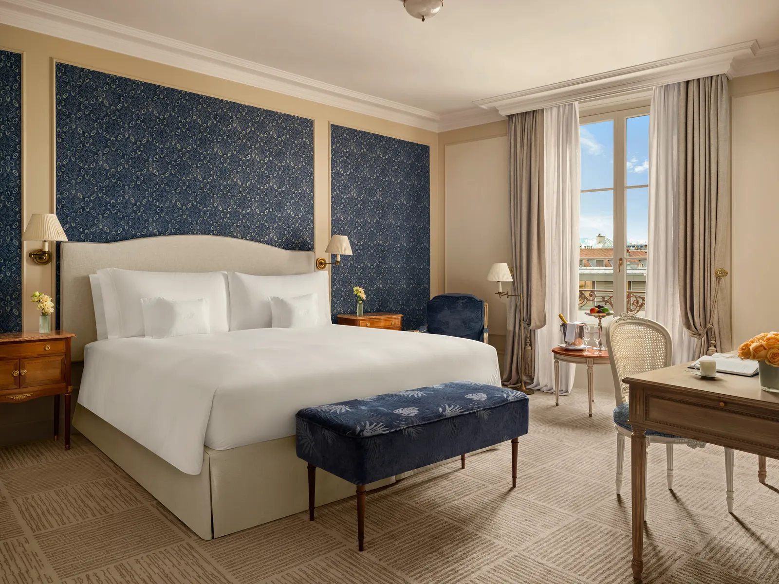 A Premier Ville View, with a blue bench at the foot of the bed