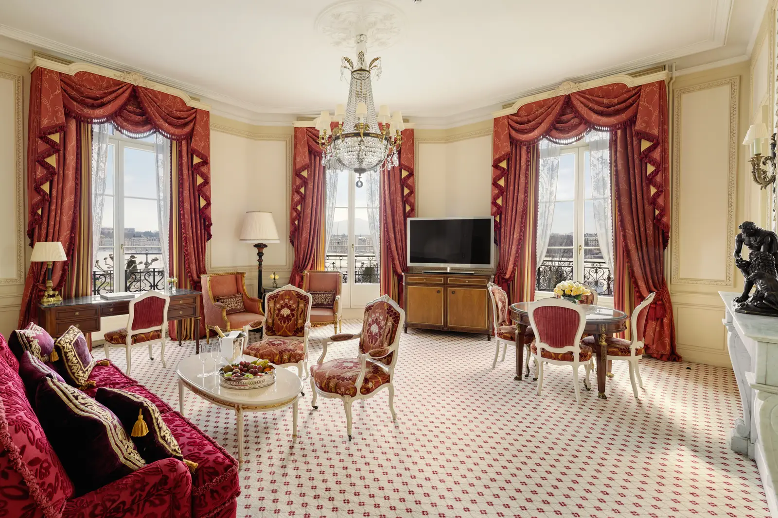 The Empress Sissi Suite living room, with red curtains