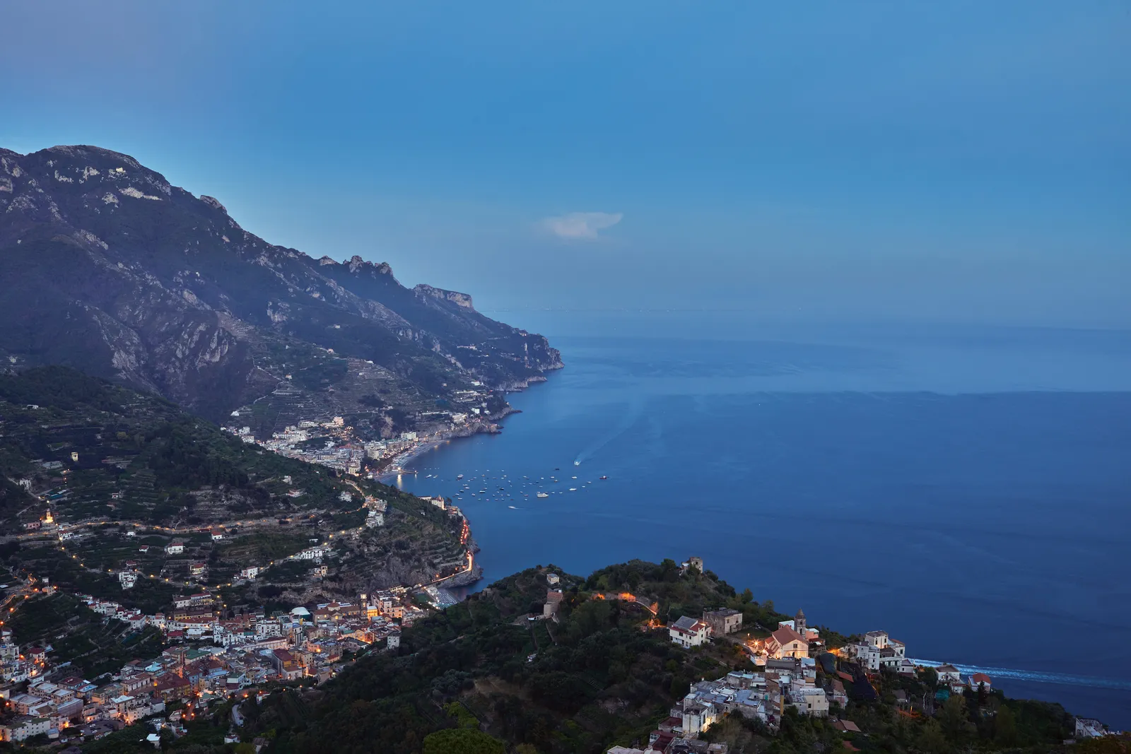 The Amalfi Coast from above: the towns along the shore, the mountains and the blue sea to the horizon.